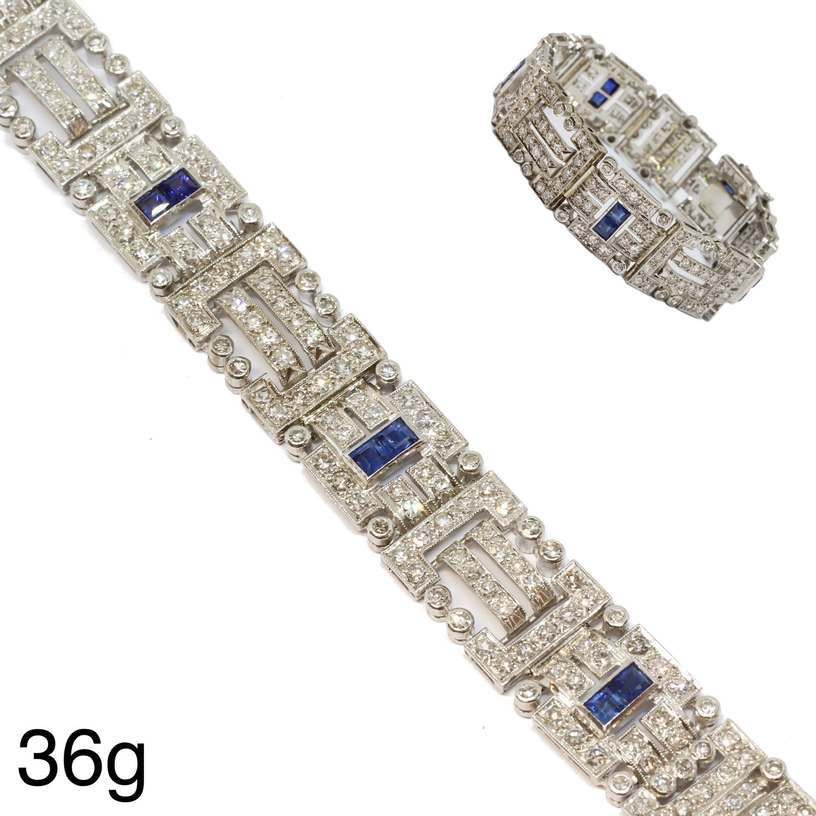 FINE ART-DECO SAPPHIRE AND DIAMOND BRACELET: FINE ART-DECO SAPPHIRE AND DIAMOND BRACELET,36 grams, testing platinum.Diamonds bright and lively, totalling approx. 6.50 ct.Rich and vibrant sapphires, totalling approx. 4 ct.L. 16 cm.