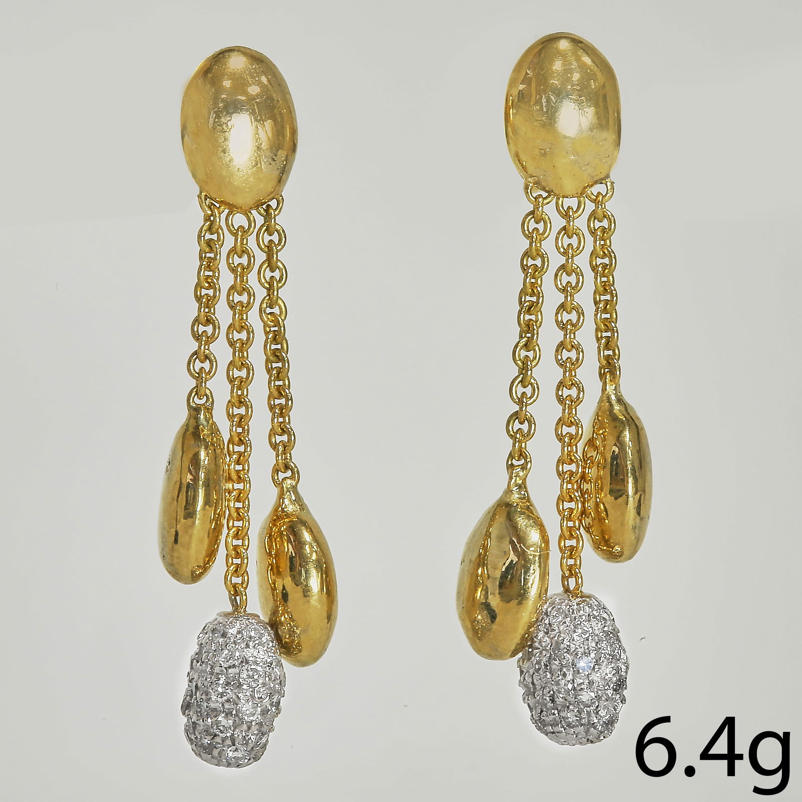 MARCO BICEGO, PAIR OF DIAMOND DROP EARRINGS: MARCO BICEGO, PAIR OF DIAMOND DROP EARRINGS,6,4 grams, 18 ct. gold.Suspending 3 drops of which one front and back pave set with diamonds.Signed Marco Bicego.L. 3.4 cm.