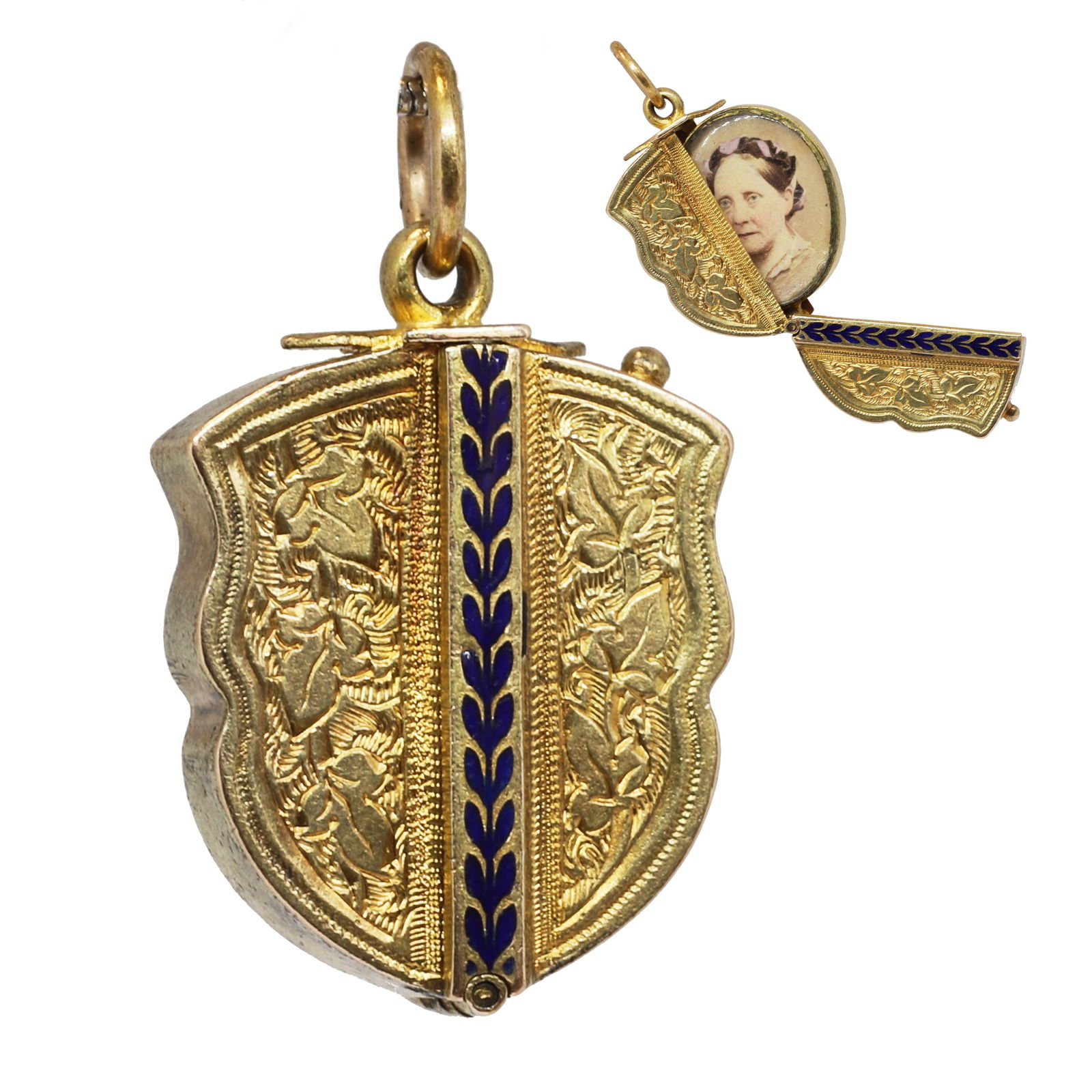 VICTORIAN ENAMEL SHIELD LOCKET PENDANT: VICTORIAN ENAMEL SHIELD LOCKET PENDANT,5.1 grams, testing high carat gold.Front and back with enamel decoration.Unusual sideways opening.L. 2.8 cm.