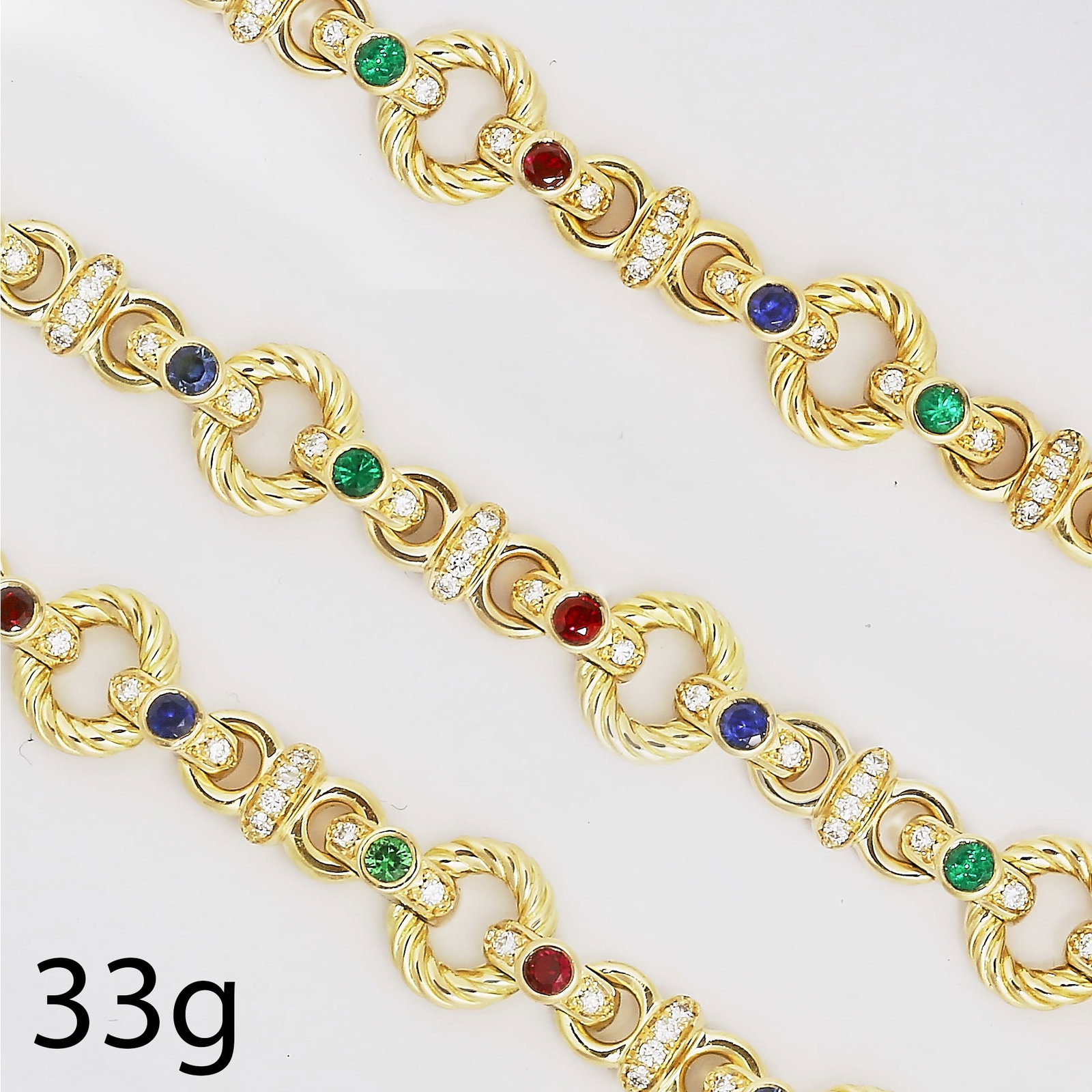 FINE DIAMOND, RUBY, SAPPHIRE AND EMERALD BRACELET: FINE DIAMOND, RUBY, SAPPHIRE AND EMERALD BRACELET,33 grams, testing high carat gold.Diamonds bright and lively.Vibrant emeralds, sapphires and rubies.L. 18 cm.
