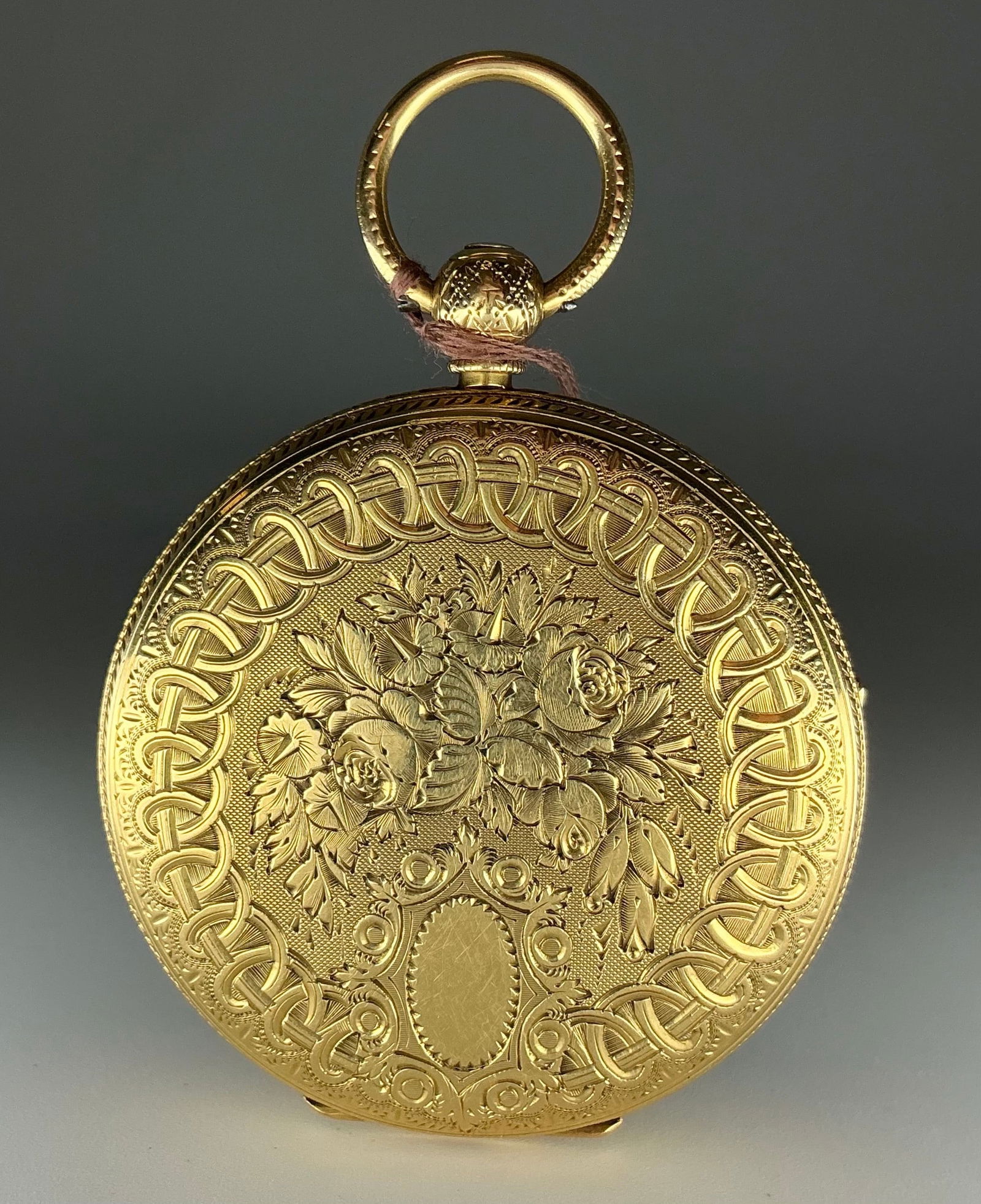ANTIQUE GOLD POCKET WATCH: ANTIQUE GOLD POCKET WATCH,71.2 grams, 18 ct. gold.Gold coloured dial with floral engraving.Roman Numerals.The back of the case with floral engraving.Key winding.Diam 43.8 mm.
