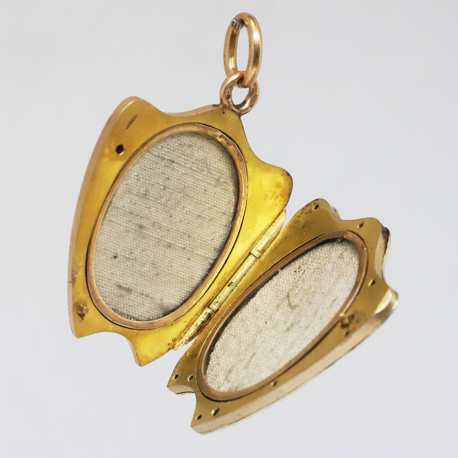 ART-NOUVEAU RUSSIAN RUBY AND DIAMOND LOCKET PENDANT: ART-NOUVEAU RUSSIAN RUBY AND DIAMOND LOCKET PENDANT,19.1 grams, testing high carat gold.Rich and vibrant ruby.Diamonds bright and lively.Indistinct marked.L. 4.7 cm.