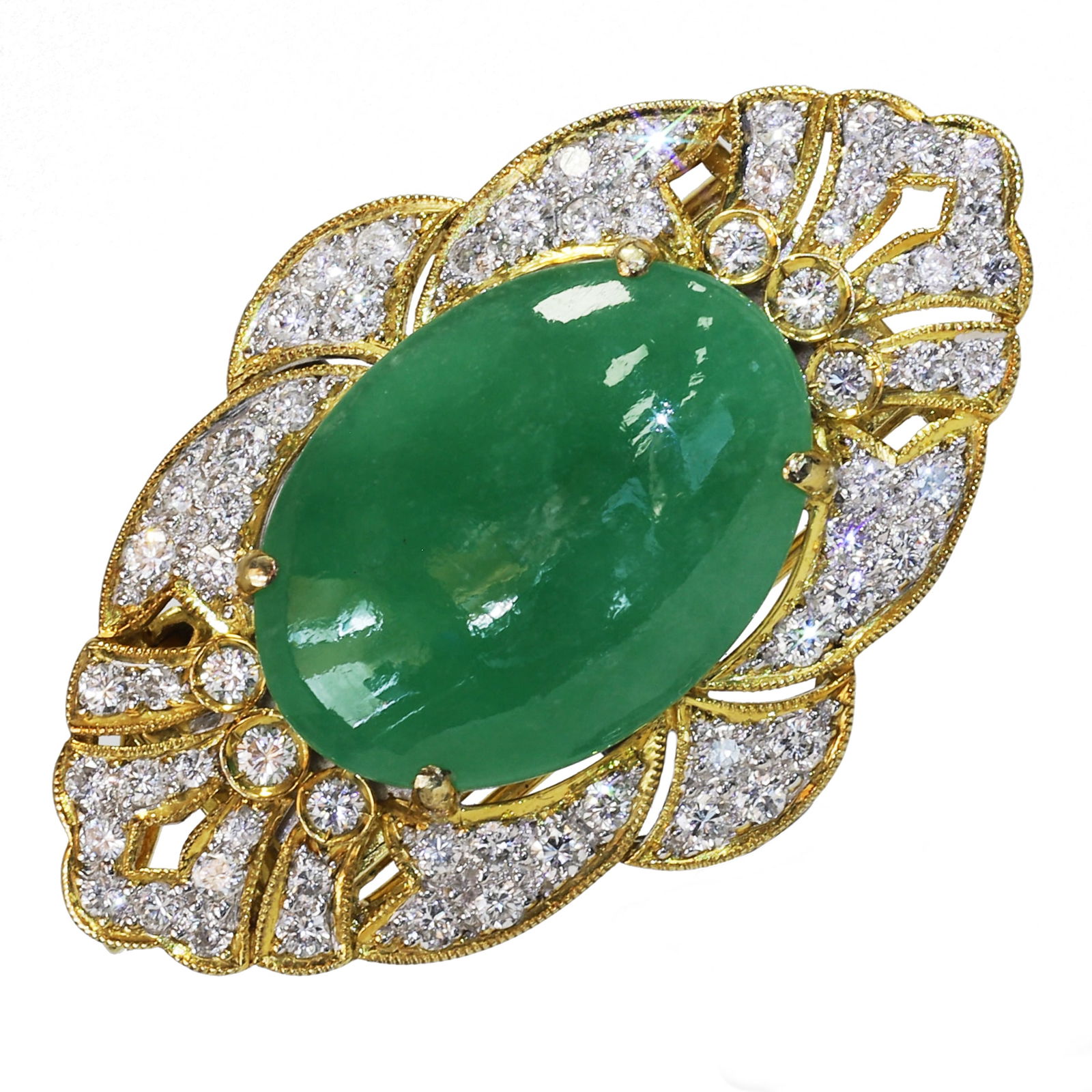 FINE JADE AND DIAMOND BROOCH/PENDANT: FINE JADE AND DIAMOND BROOCH/PENDANT,14.8 grams, stamped 585.Lively green jade cabochon of approx. 20 x 14.6 mm.Bright and lively diamonds, totalling approx. 1.50 ct.Removable bail.L. 3.9 cm.