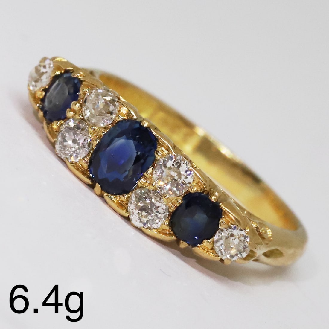 SAPPHIRE AND DIAMOND RING: SAPPHIRE AND DIAMOND RING,6,4 grams, 18 ct. gold.Rich and vibrant sapphires totalling approx. 1.22 ct.Diamonds bright and lively.Size R 1/2.