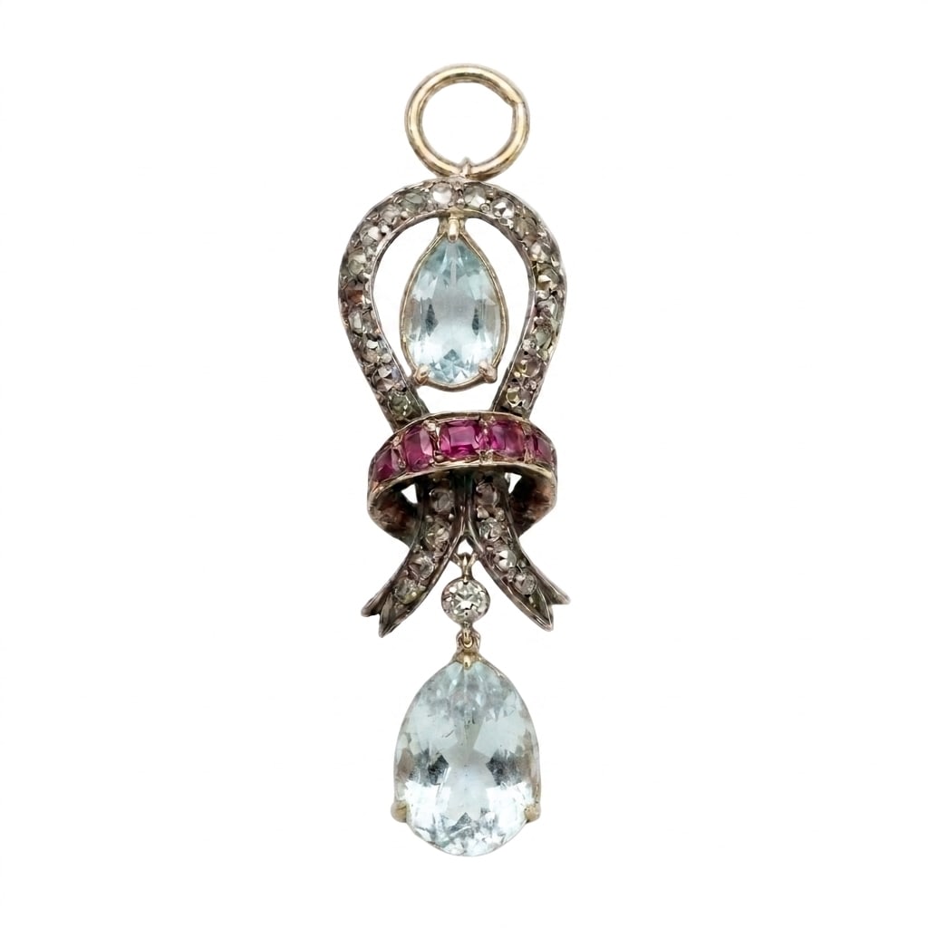 ANTIQUE DIAMOND, RUBY AND AQUAMARINE PENDANT: ANTIQUE DIAMOND, RUBY AND AQUAMARINE PENDANT,testing high carat gold.Rich and vibrant aquamarinesDiamonds bright and lively.Vibrant rubies.L. 3.7 cm.