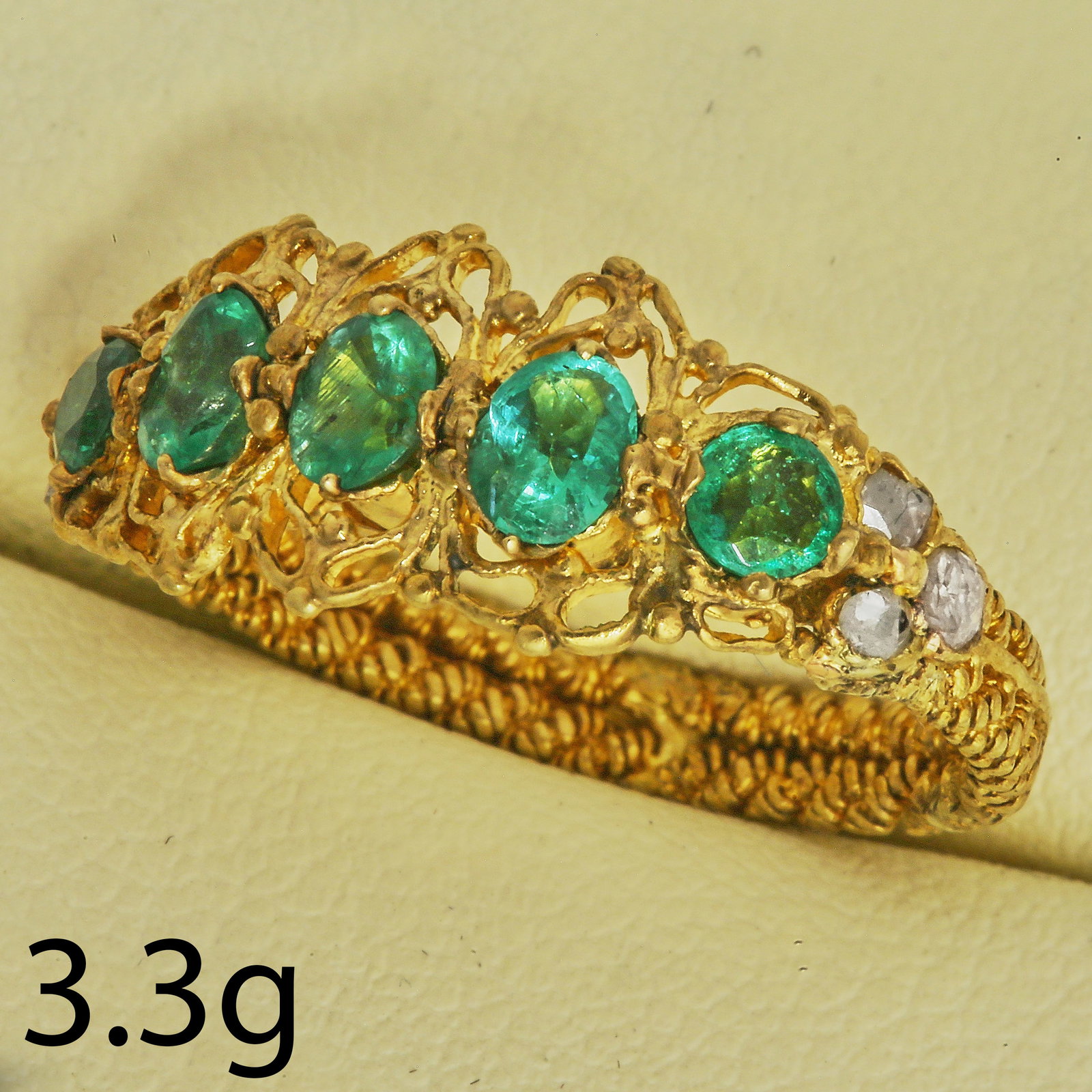 LOVELY ANTIQUE EMERALD 5-STONE RING: LOVELY ANTIQUE EMERALD 5-STONE RING,3.3 grams, testing high carat gold.Vibrant emeralds, totalling approx. 0.85 ct.Size J.