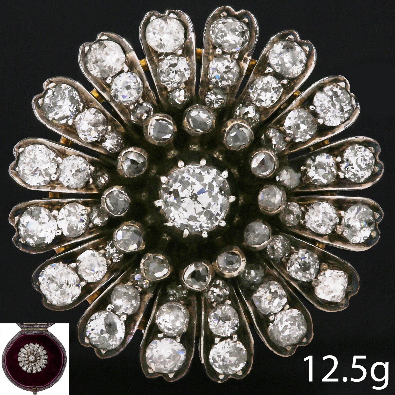 ANTIQUE DIAMOND SET FLOWER BROOCH: ANTIQUE DIAMOND SET FLOWER BROOCH. 12.5 gramsDiamonds totalling approx. 4 ct.Centre diamond of approx. 0.55 ct.2.8 cm diameter. Fine workmanship, good condition, with antique fitted box.