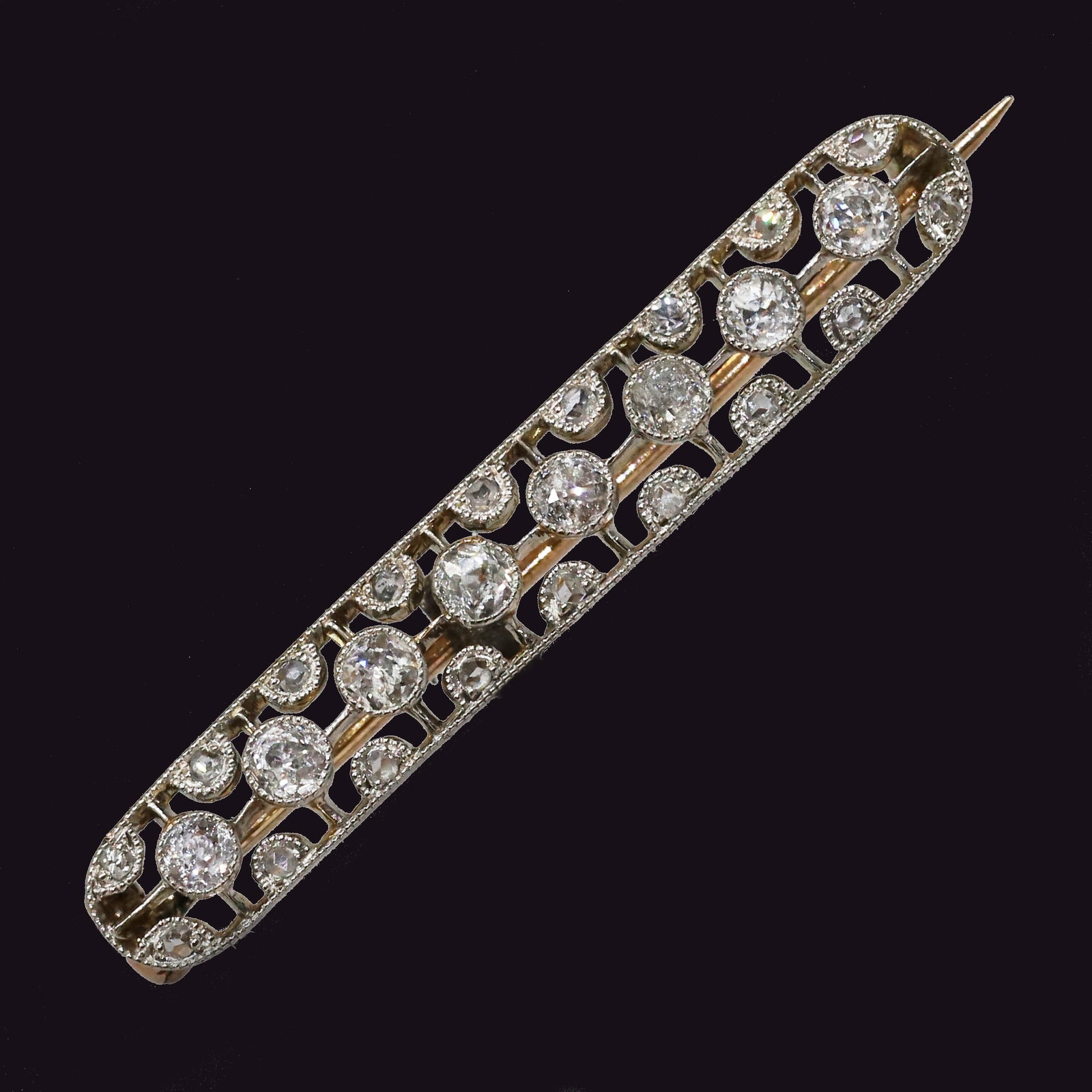 EDWARDIAN DIAMOND BROOCH: EDWARDIAN DIAMOND BROOCH,3,.5 grams. testing high carat gold and platinum.Diamonds bright and lively.W. 4 cm.