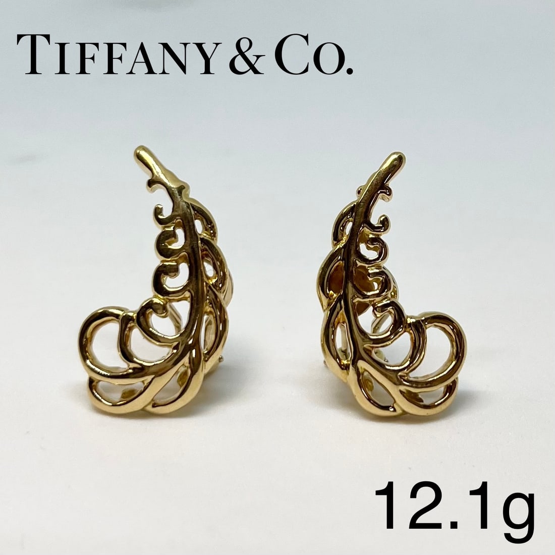 TIFFANY & CO, PALOMA PICASSO, GOLD PLUME EARRINGS: TIFFANY & CO, PALOMA PICASSO, GOLD PLUME EARRINGS,12.1 grams high carat gold signed tiffany in excellent condition L 2.7 cm