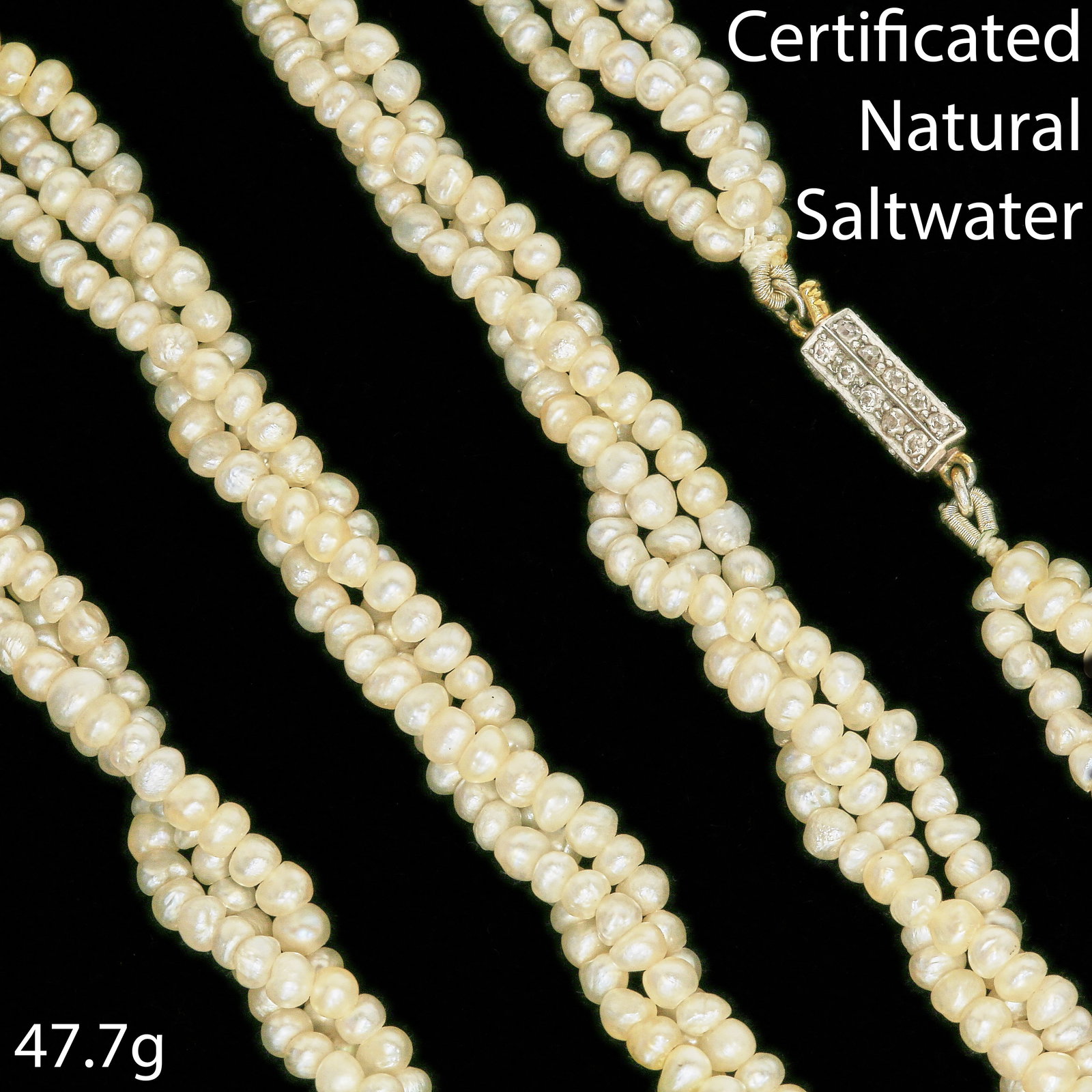 CERTIFICATED NATURAL SALTWATER THREE ROW PEARL NECKLACE: CERTIFICATED NATURAL SALTWATER THREE ROW PEARL NECKLACE 47.7 grams with a diamond clasp, fine, well matched natural pearls L 98 cm