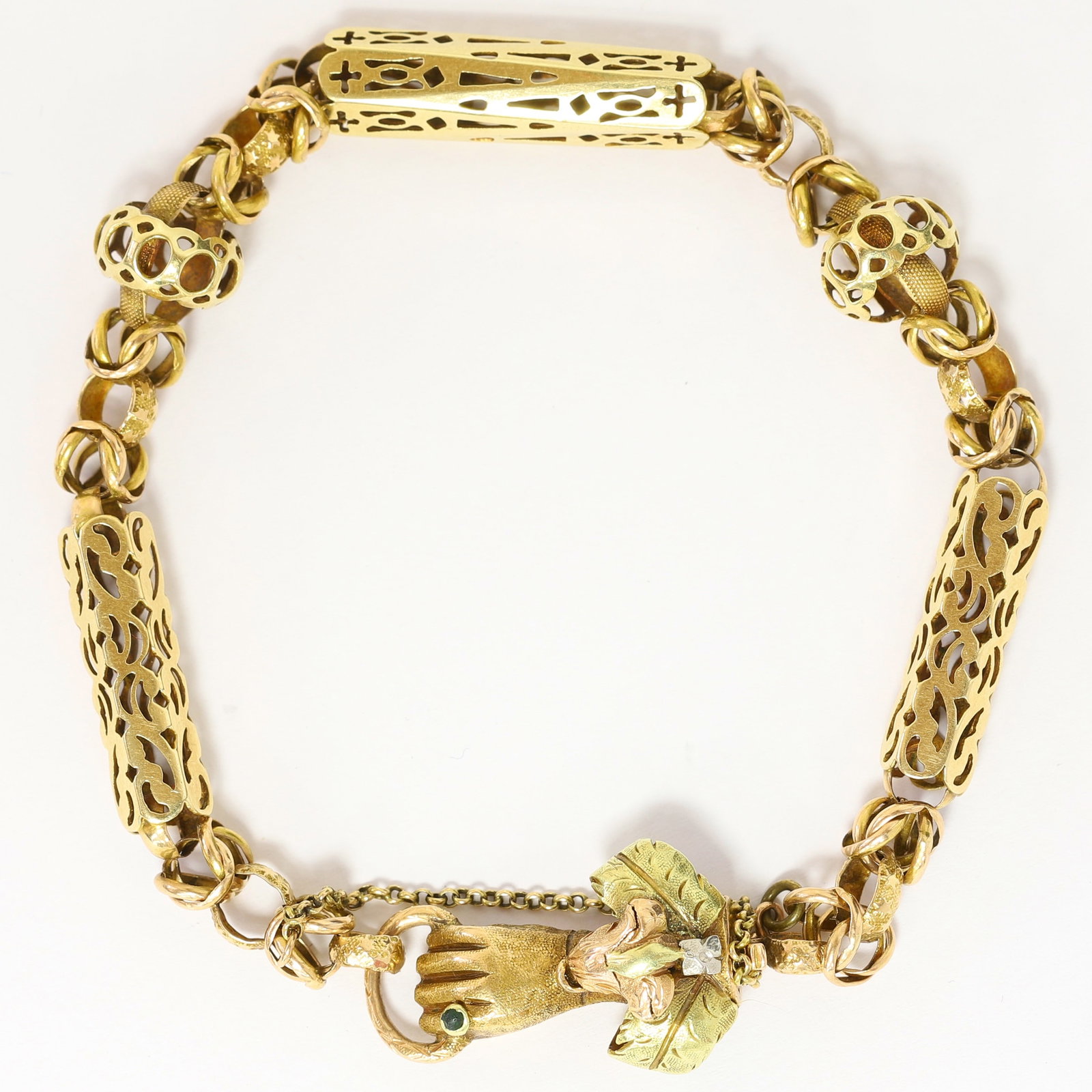 LOVELY ANTIQUE HAND CLASP FANCY LINK BRACELET: LOVELY ANTIQUE HAND CLASP FANCY LINK BRACELET,11.9 grams, testing high carat gold.The bracelet of fine fancy link design.The hand clasp in 3-colour gold.L. 20 cm.