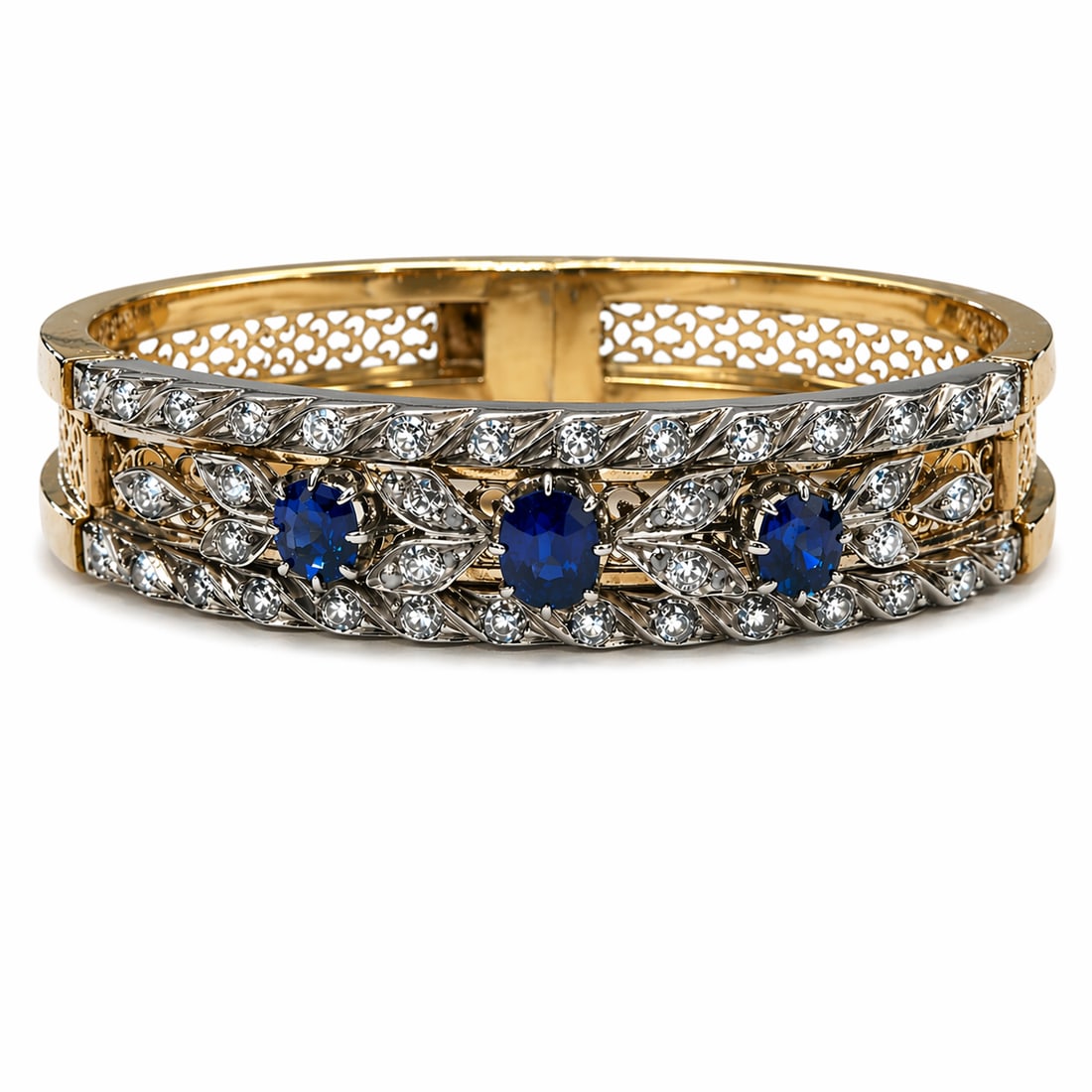 ANTIQUE SAPPHIRE AND DIAMOND HINGED BANGLE: ANTIQUE SAPPHIRE AND DIAMOND HINGED BANGLE 31 grams set with rich vibrant sapphiresapprox 2 ct lively diamonds approx 1.40 ct5.7 cm inner diameter