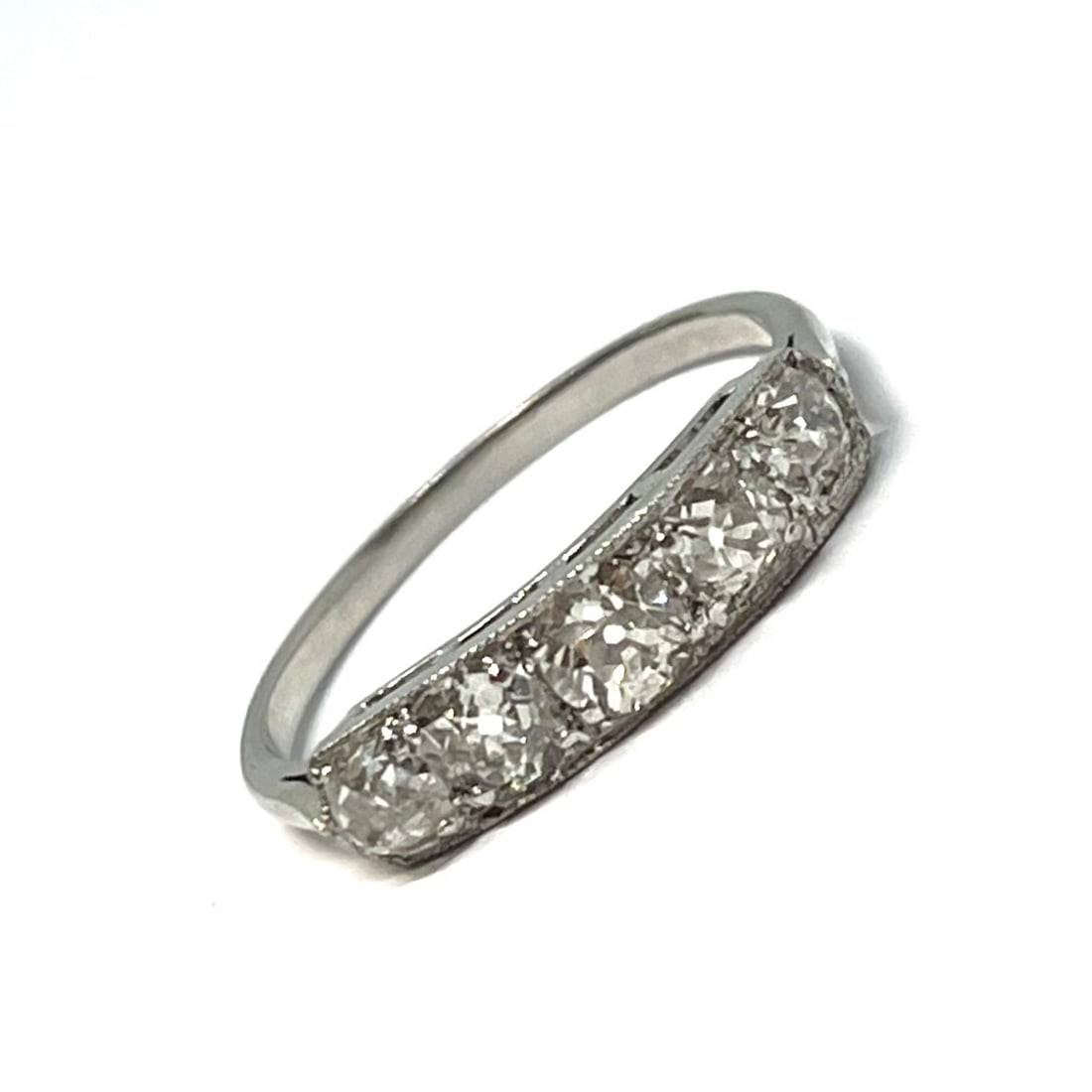EDWARDIAN DIAMOND 5-STONE RING: EDWARDIAN DIAMOND 5-STONE RING,Testing platinum.Diamonds bright and lively, totalling approx. 1.15 ct.Size N 1/2.