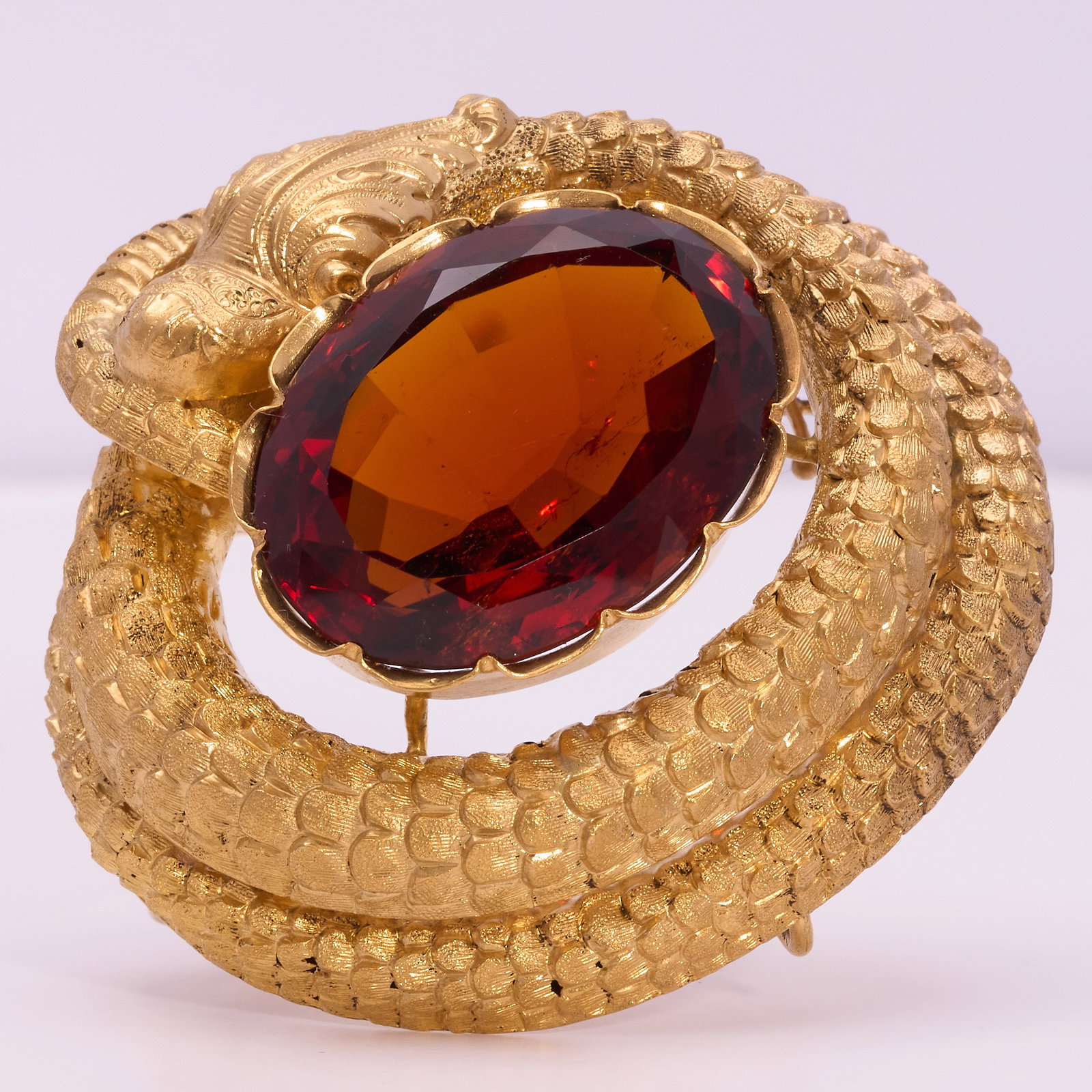 IMPRESSIVE SNAKE CITRINE BROOCH: IMPRESSIVE SNAKE CITRINE BROOCH 20 grams high carat with rich vibrant citrine with no abrasions fine craftsmanship L 4.4 cm W 4.5 cm