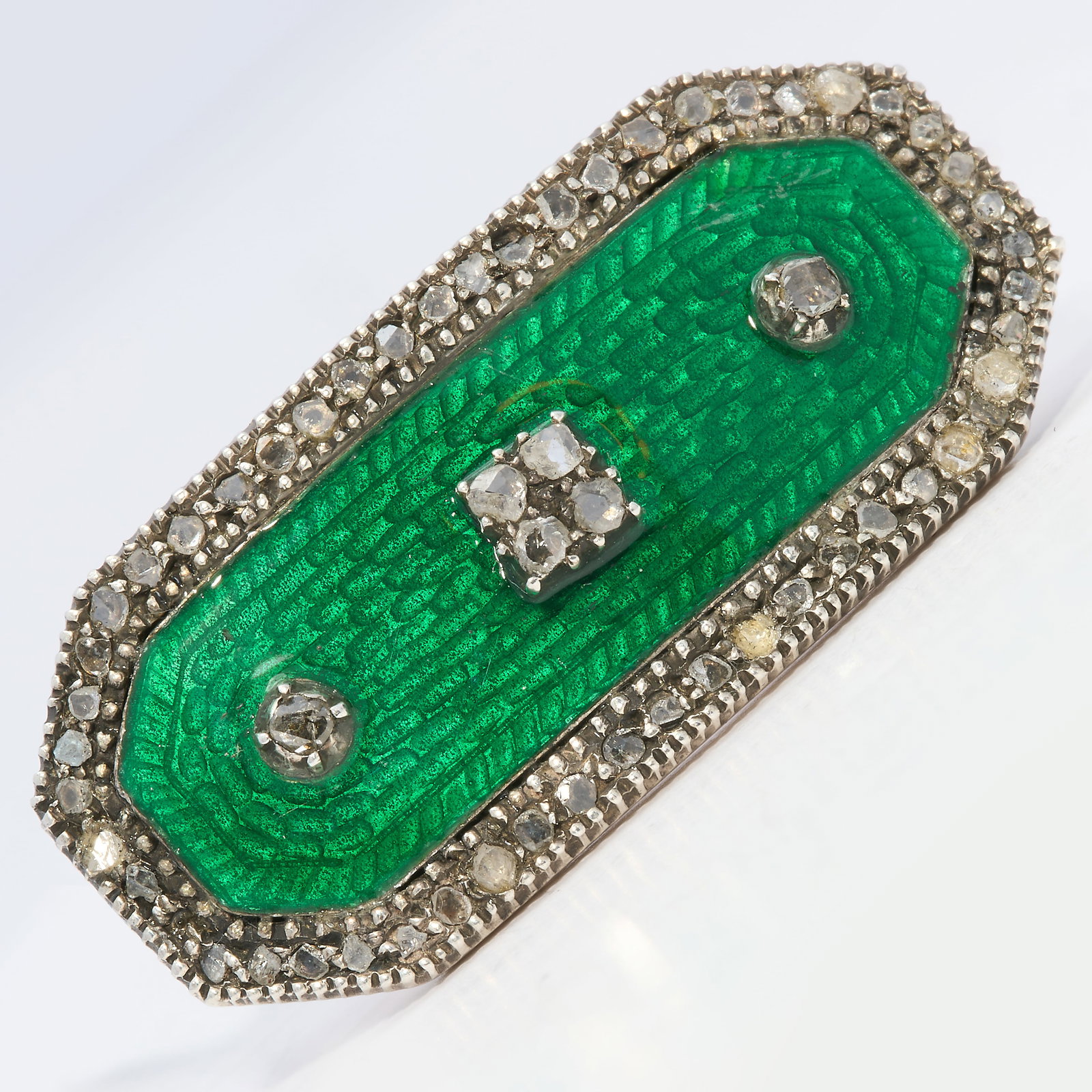 ANTIQUE GREEN ENAMEL AND DIAMOND BROOCH: ANTIQUE GREEN ENAMEL AND DIAMOND BROOCH,6.8 grams.Lovely vibrant green enamel.Diamonds bright and lively.W. 2.9 cm.
