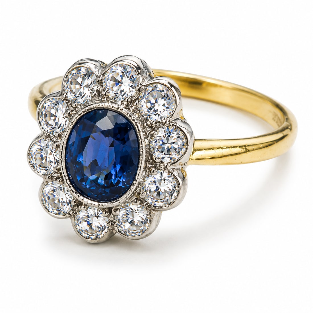 SAPPHIRE AND DIAMOND CLUSTER RING: SAPPHIRE AND DIAMOND CLUSTER RING3.3 grams, marked 18 carat gold. Vibrant sapphire, bright and lively diamonds. Size N.
