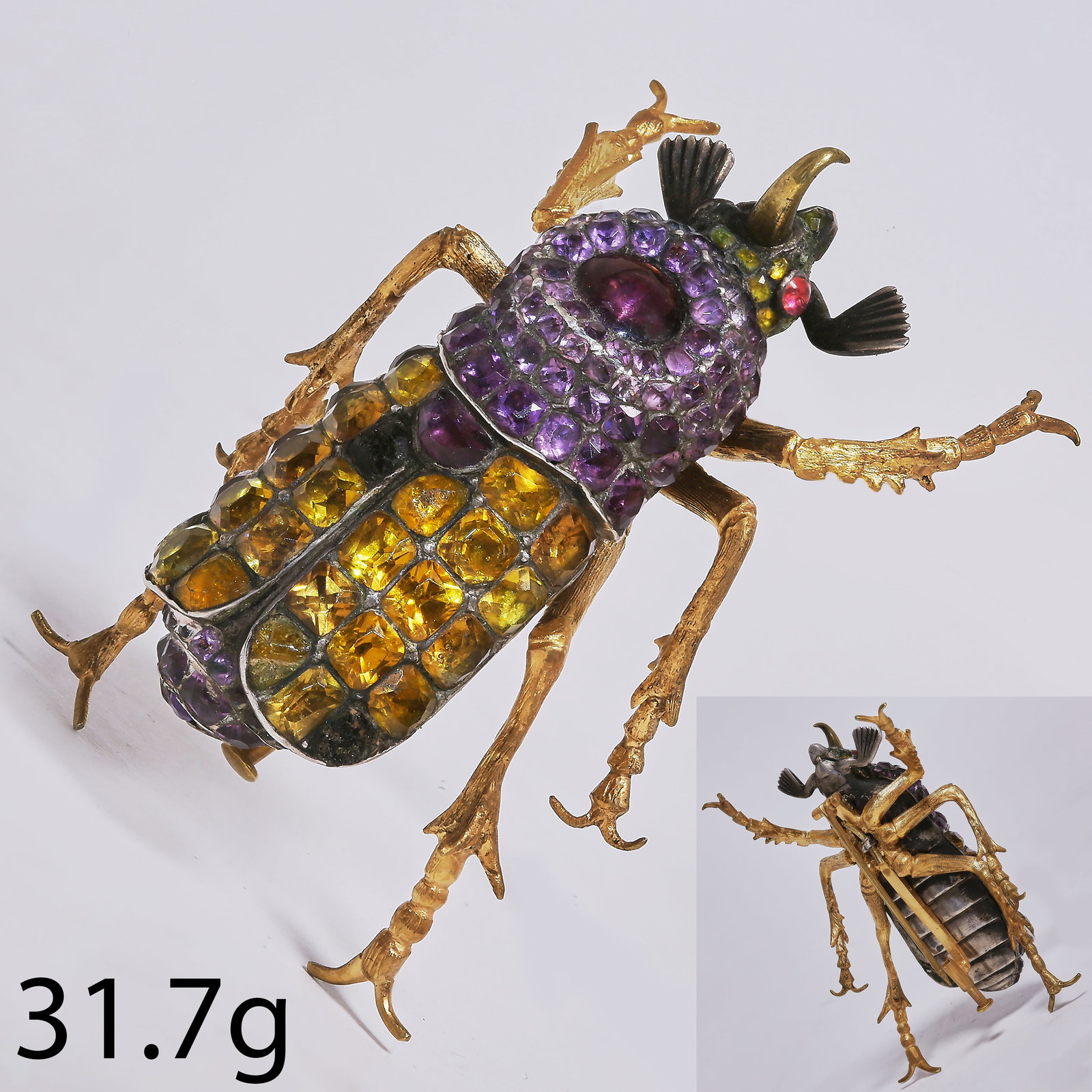 MAGNIFICENT AND RARE GEORGIAN 18TH CENTURY BEETLE BROOCH: MAGNIFICENT AND RARE GEORGIAN 18TH CENTURY BEETLE BROOCH, 31.7 grams.Set with orange and purple paste stones to the wings, body and head.L 5.6 cm.