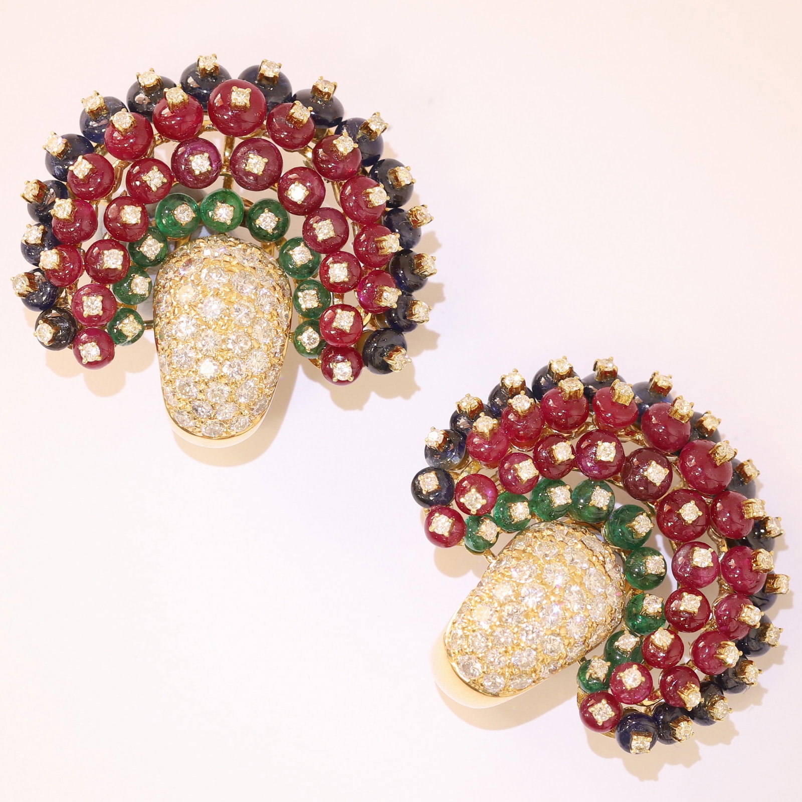 FINE PAIR OF DIAMOND, EMERALD, RUBY AND SAPPHIRE EARRINGS: FINE PAIR OF DIAMOND, EMERALD, RUBY AND SAPPHIRE EARRINGS,35.3 grams, testing 18 ct. gold.The earrings of fine fan shaped design.Bright and lively diamonds.W. 3.6 cm.Possibly by David Webb.