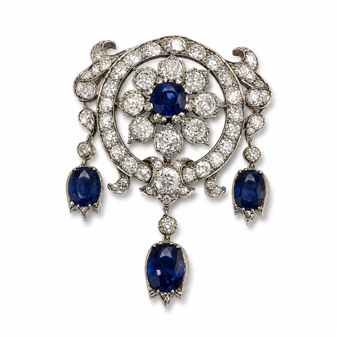 MAGNIFICENT VICTORIAN DIAMOND AND SAPPHIRE BROOCH: MAGNIFICENT VICTORIAN DIAMOND AND SAPPHIRE BROOCH 16.8 grams rich vibrant matching sapphires, approx. 6.60 ct. bright lively old cut diamonds, approx. 10 ct. L 5.8 cm W 4 cm.