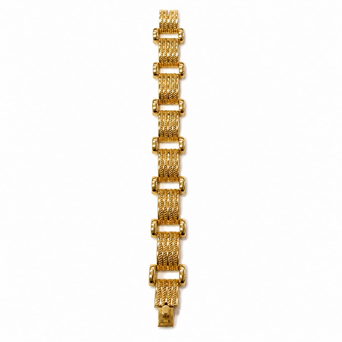 TIFFANY & CO. RETRO GOLD BRACELET: TIFFANY & CO. RETRO GOLD BRACELET,46.5 grams, 14 ct. gold.The links with part twisted rope design.L. 18 cm.Signed Tiffany.
