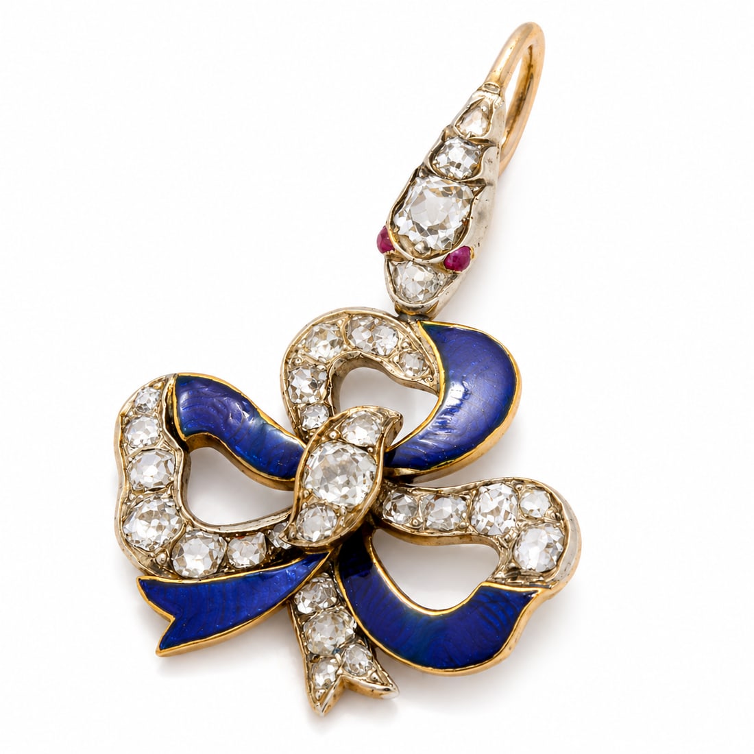 VICTORIAN DIAMOND AND ENAMEL SNAKE AND BOW PENDANT: VICTORIAN DIAMOND AND ENAMEL SNAKE AND BOW PENDANT,3,7 grams, testing high carat gold.The snake set with bright and lively diamonds and ruby eyes.Suspending the bow from its mouth, set with bright