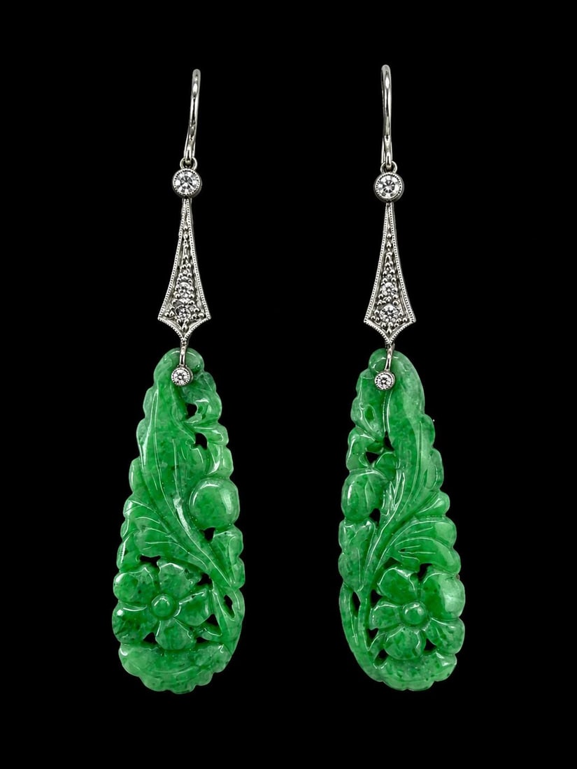 PAIR OF ART-DECO JADE AND DIAMOND EARRINGS: PAIR OF ART-DECO JADE AND DIAMOND EARRINGS,4.9 grams. Diamonds bright and lively.Lovely carved jade.L. 6.2 cm.