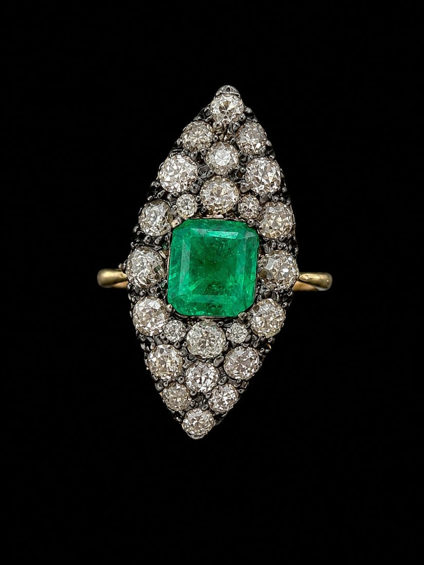 FINE EMERALD AND DIAMOND MARQUISE SHAPED RING: FINE EMERALD AND DIAMOND MARQUISE SHAPED RING,5,5 grams, 18 ct. gold.Rich and vibrant emerald of approx. 1.90 ct.Diamonds bright and lively, totalling approx. 1.50 ct.L. head 2.9 cm.Size O.
