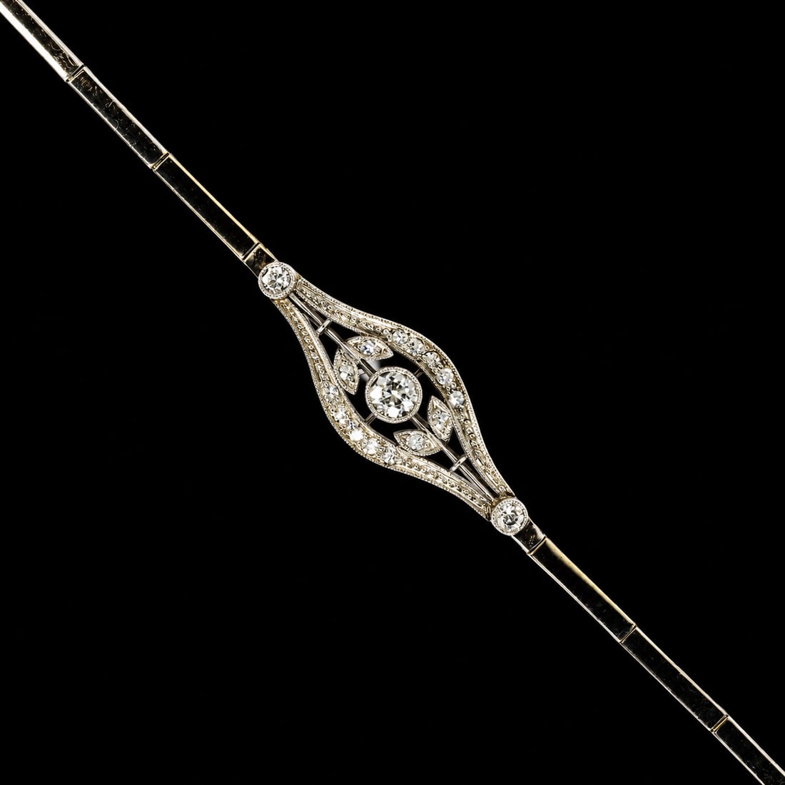 ART-DECO DIAMOND BRACELET: ART-DECO DIAMOND BRACELET,10.5 grams, testing high carat gold.Diamonds bright and lively.L. 17.5 cm.