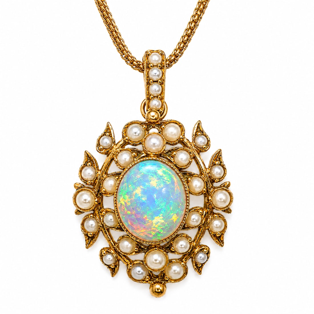ANTIQUE PEARL AND OPAL GOLD PENDANT AND CHAIN: ANTIQUE PEARL AND OPAL GOLD PENDANT AND CHAIN6.6 grams, testing high carat gold. Pearls untested, assumed to be natural. lovely opal with nice play of colour.L. chain 48 cm. L. pendant 3.2 cm.