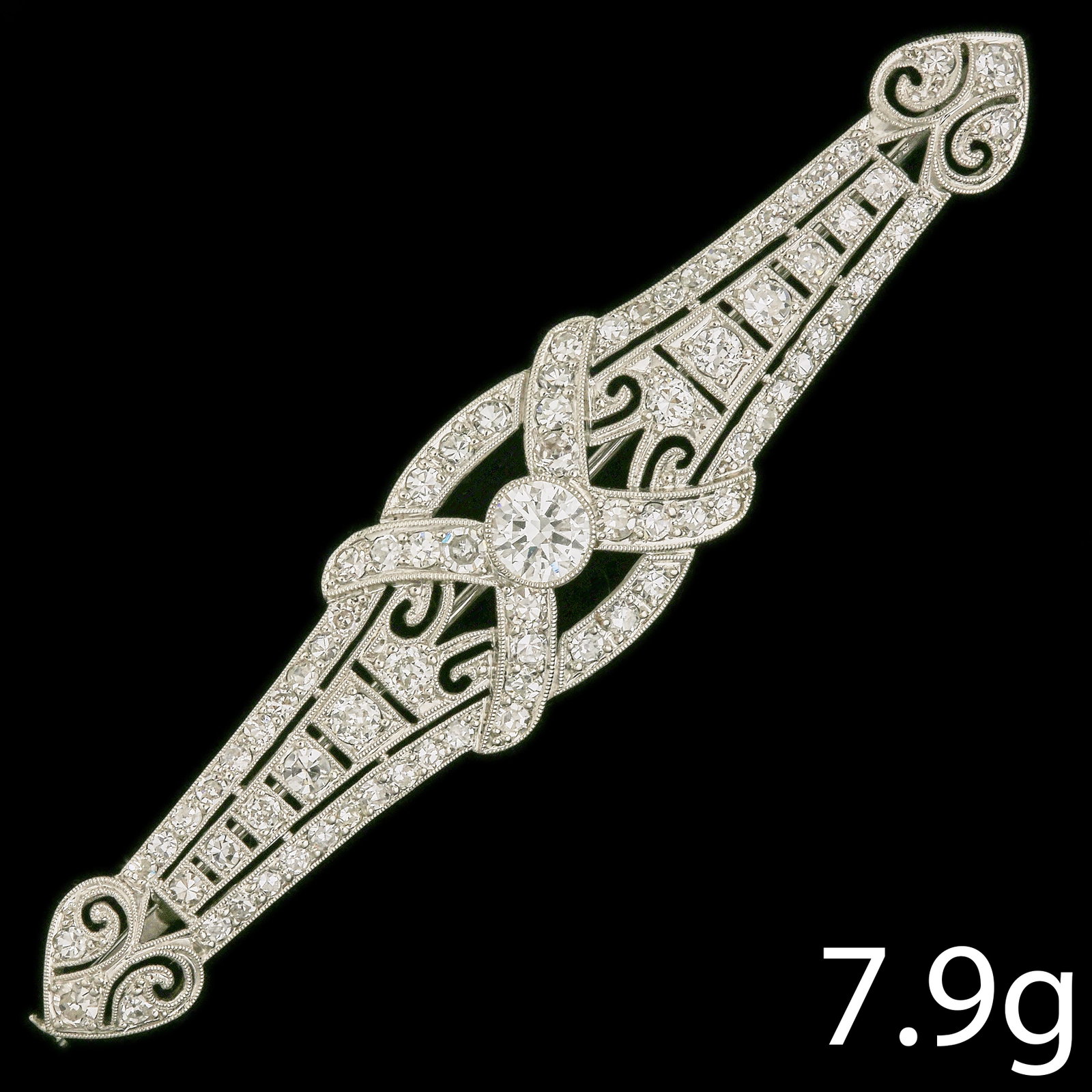 FINE ART-DECO DIAMOND BROOCH: FINE ART-DECO DIAMOND BROOCH,7,9 grams, testing high carat gold.Bright and lively diamonds with larger diamond to the centre, totalling approx. 3 ct.W. 7 cm.