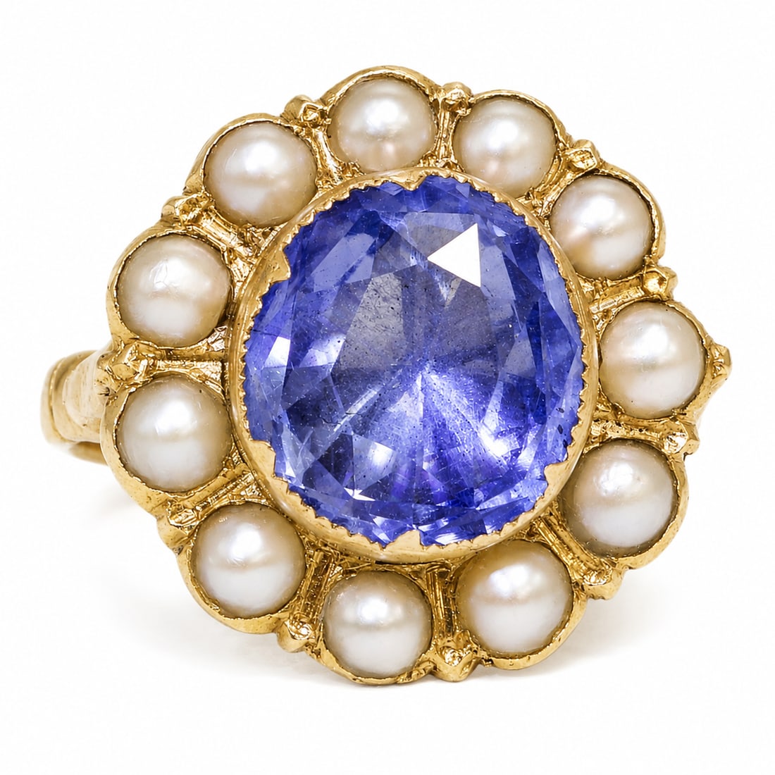 UNUSUAL ANTIQUE SAPPHIRE AND PEARL CLUSTER RING: UNUSUAL ANTIQUE SAPPHIRE AND PEARL CLUSTER RING,4.9 grams.Set with a fine sapphire of approx. 4.90 ct.Surrounded with pearls. (untested, believed to be natural).Size N 1/2.