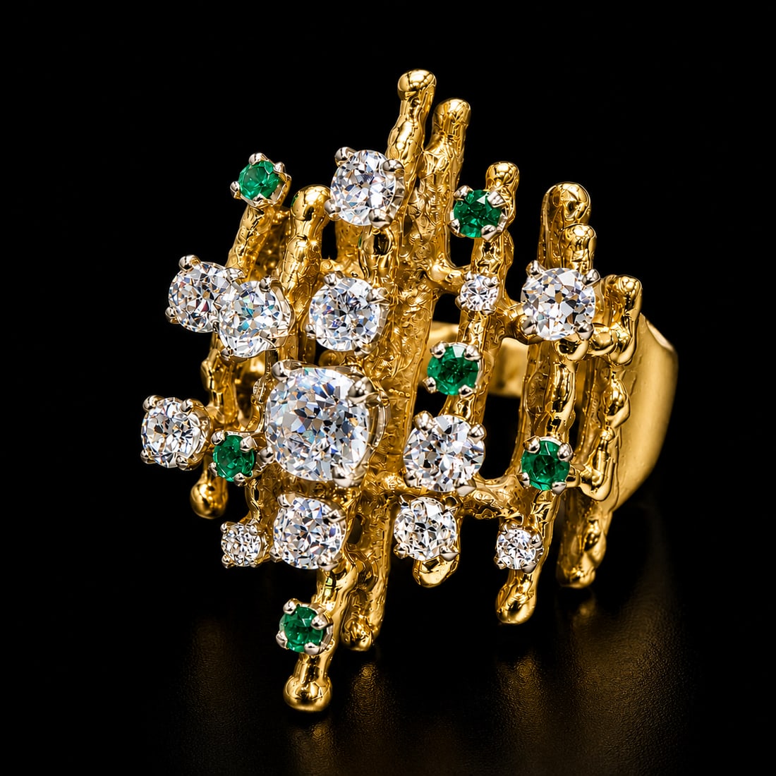 ABSTRACT MODERNIST EMERALD AND DIAMOND RING: ABSTRACT MODERNIST EMERALD AND DIAMOND RING,14.1 grams, testing high carat gold.Bright and lively old cut diamonds.Rich and vibrant emeralds.Size O.