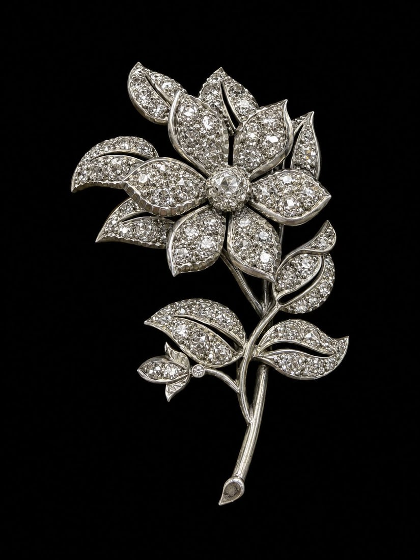 VICTORIAN EN TREMBLANT DIAMOND SPRAY BROOCH: VICTORIAN EN TREMBLANT DIAMOND SPRAY BROOCH,15,5 grams, testing high carat gold and silver.The flowerhead en tremblant.Diamonds bright and lively, totalling approx. 3.50 ct.L. 5.9 cm.