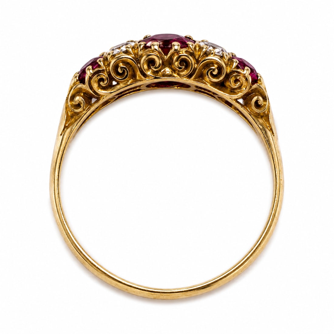 ANTIQUE RUBY AND DIAMOND RING: ANTIQUE RUBY AND DIAMOND RING,3.2 grams, testing 18 ct. gold.Rich and vibrant rubies, totalling approx. 0.90 ct.Diamonds bright and lively.Size N 1/2.