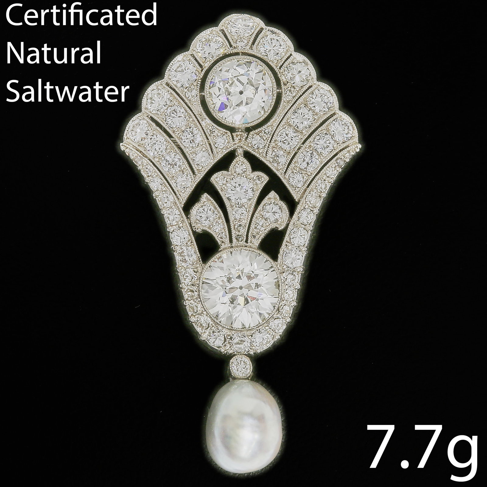 CERTIFICATED NATURAL SALTWATER PEARL AND DIAMOND BROOCH: CERTIFICATED NATURAL SALTWATER PEARL AND DIAMOND BROOCH,7,7 grams, testing high carat gold.Set with 2 largest diamonds, of approx. 1.95 ct. and 1.05 ct.Diamonds totalling approx. 4,75 ct.Suspending a