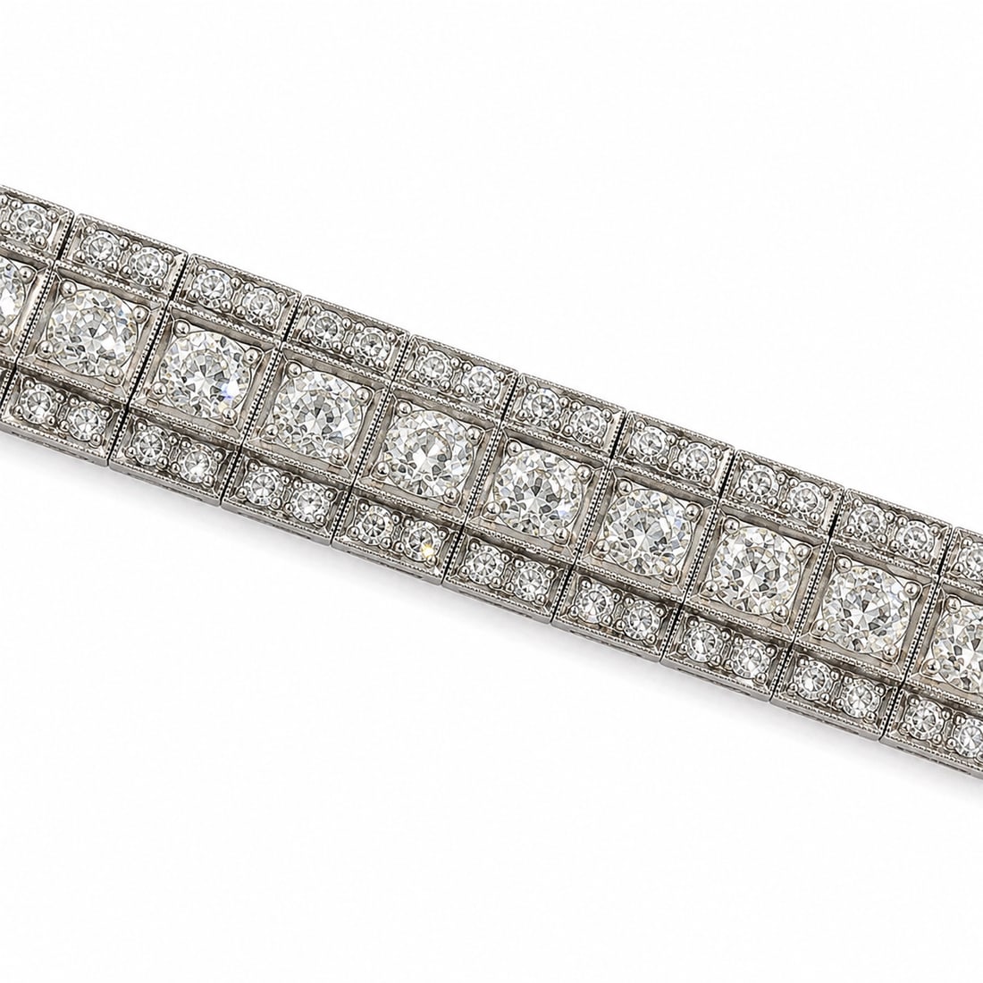 FINE ART-DECO DIAMOND BRACELET: FINE ART-DECO DIAMOND BRACELET,37.2 grams, testing platinum.Bright and lively old cut diamonds, totalling approx. 14.50 ct.L. 18.5 cm.