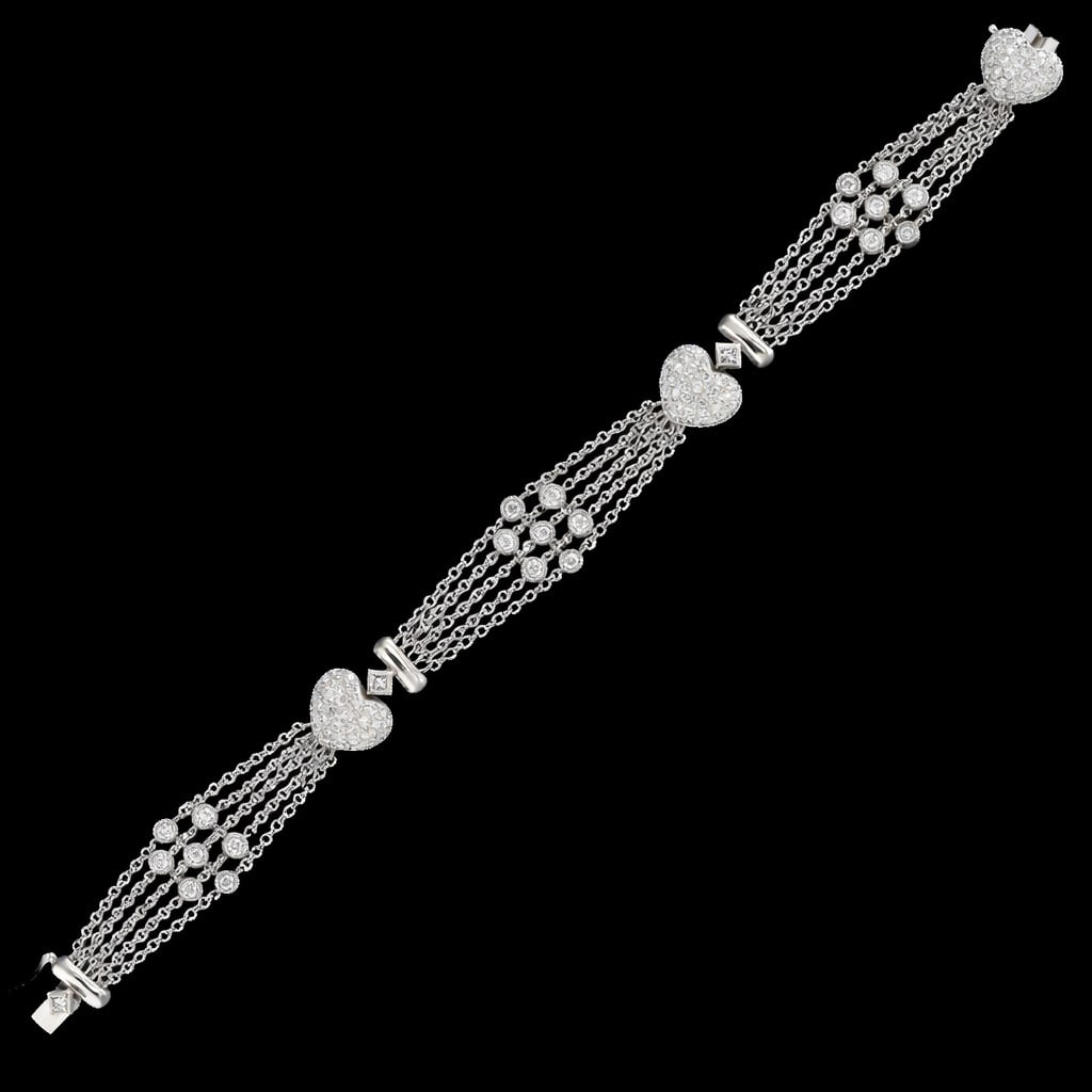 DIAMOND SET BRACELET WITH HEART SHAPED LINKS: DIAMOND SET BRACELET WITH HEART SHAPED LINKS 17.7 grams high carat gold bright lively diamonds approx 2.40 ct in excellent condition L 17.5
