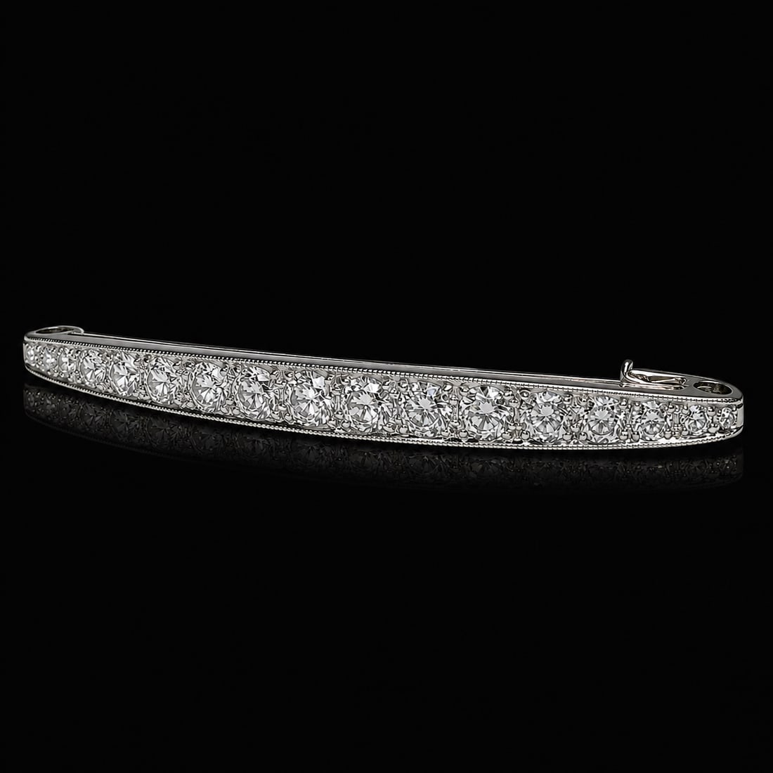 EDWARDIAN DIAMOND BAR BROOCH: EDWARDIAN DIAMOND BAR BROOCH 3.4 grams high carat gold and platinum bright lively old cut diamonds approx 1.70 ct W 4.6 cm
