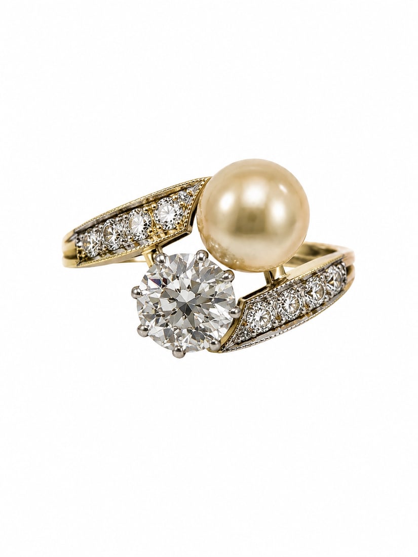 ELEGANT CERTIFICATED NATURAL SALTWATER PEARL AND DIAMOND CROSSOVER RING: ELEGANT CERTIFICATED NATURAL SALTWATER PEARL AND DIAMOND CROSSOVER RING 5.9 grams high carat gold fine saltater pearl bright lively old cut diamonds central diamond approx 1.01 ct size M for certifica
