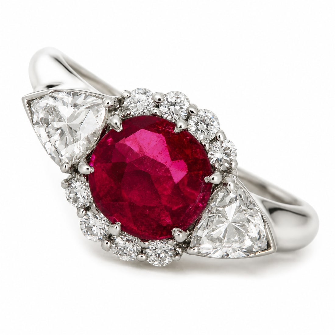 RUBY AND DIAMOND CLUSTER RING: RUBY AND DIAMOND CLUSTER RING. 4.7 Grams, testing high carat gold.Vibrant ruby of approx. 1.08 ct.Diamonds bright and lively, totalling approx. 0.95 ct.Size O.