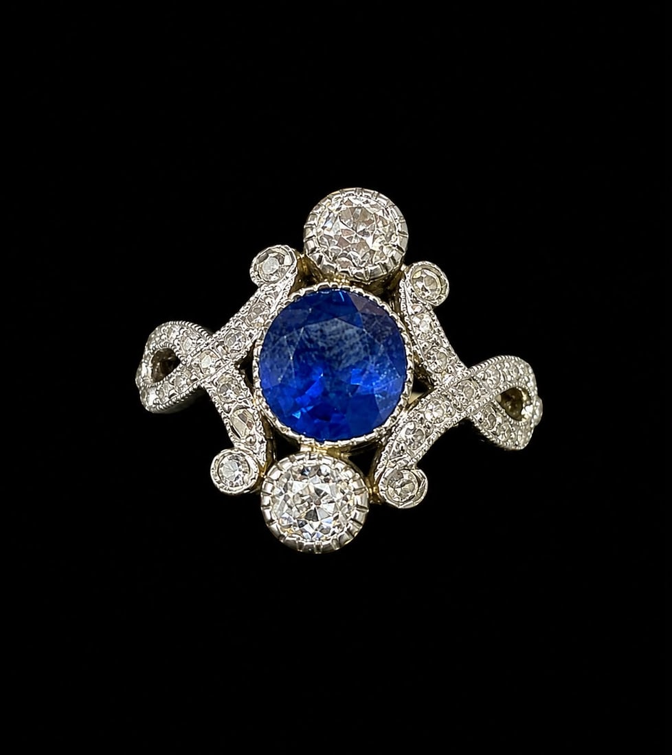 SAPPHIRE AND DIAMOND RING: SAPPHIRE AND DIAMOND RING,4 grams, 18 ct. gold.Rich and vibrant sapphire of approx. 1.28 ct.Diamonds bright and lively.Size O.