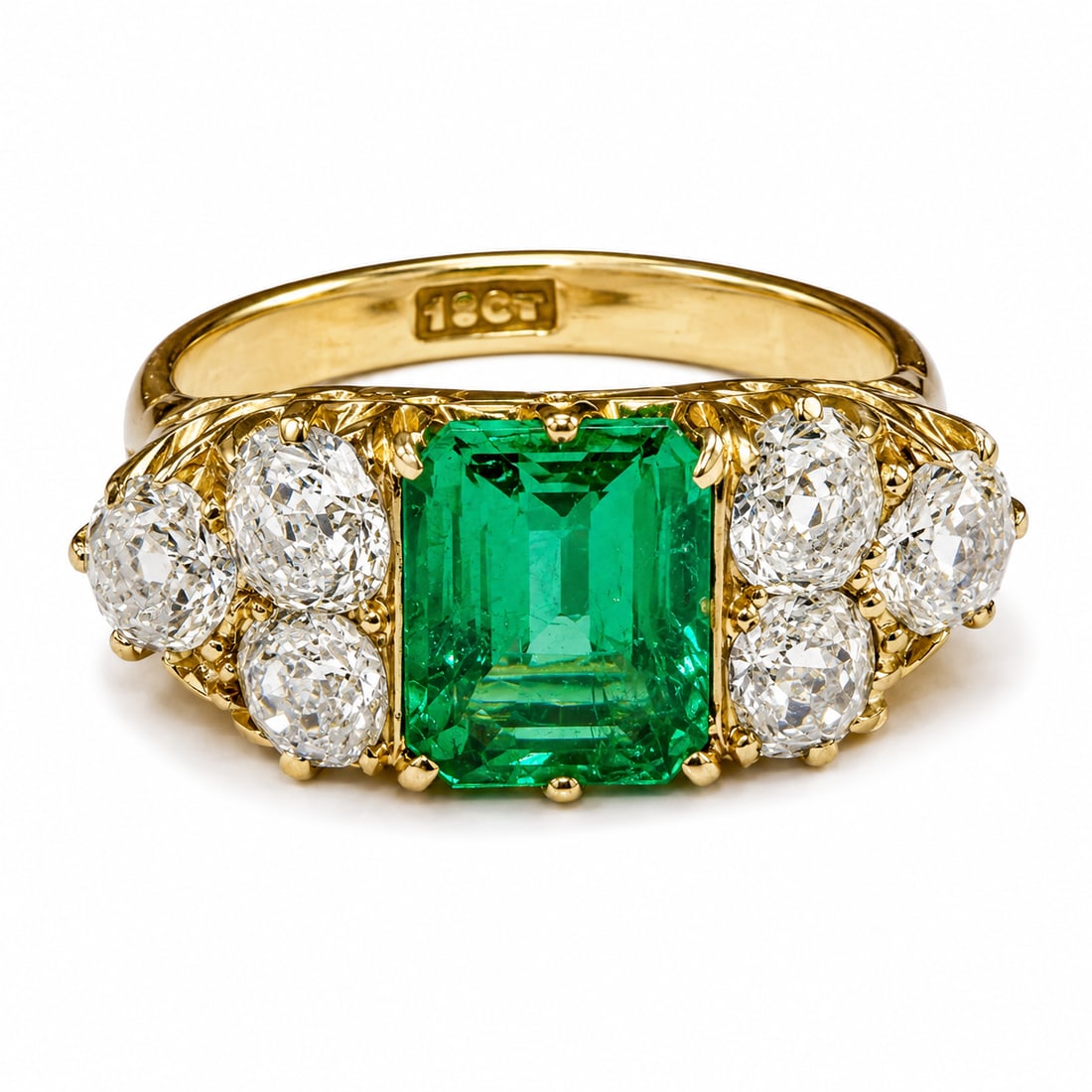 FANTASTIC COLOMBIAN EMERALD AND DIAMOND RING: FANTASTIC COLOMBIAN EMERALD AND DIAMOND RING,6,9 grams, 18 ct. gold.Fine quality emerald of approx. 1.96 ct.Lovely old cut diamonds, totalling approx. 1.70 ct.Size O.