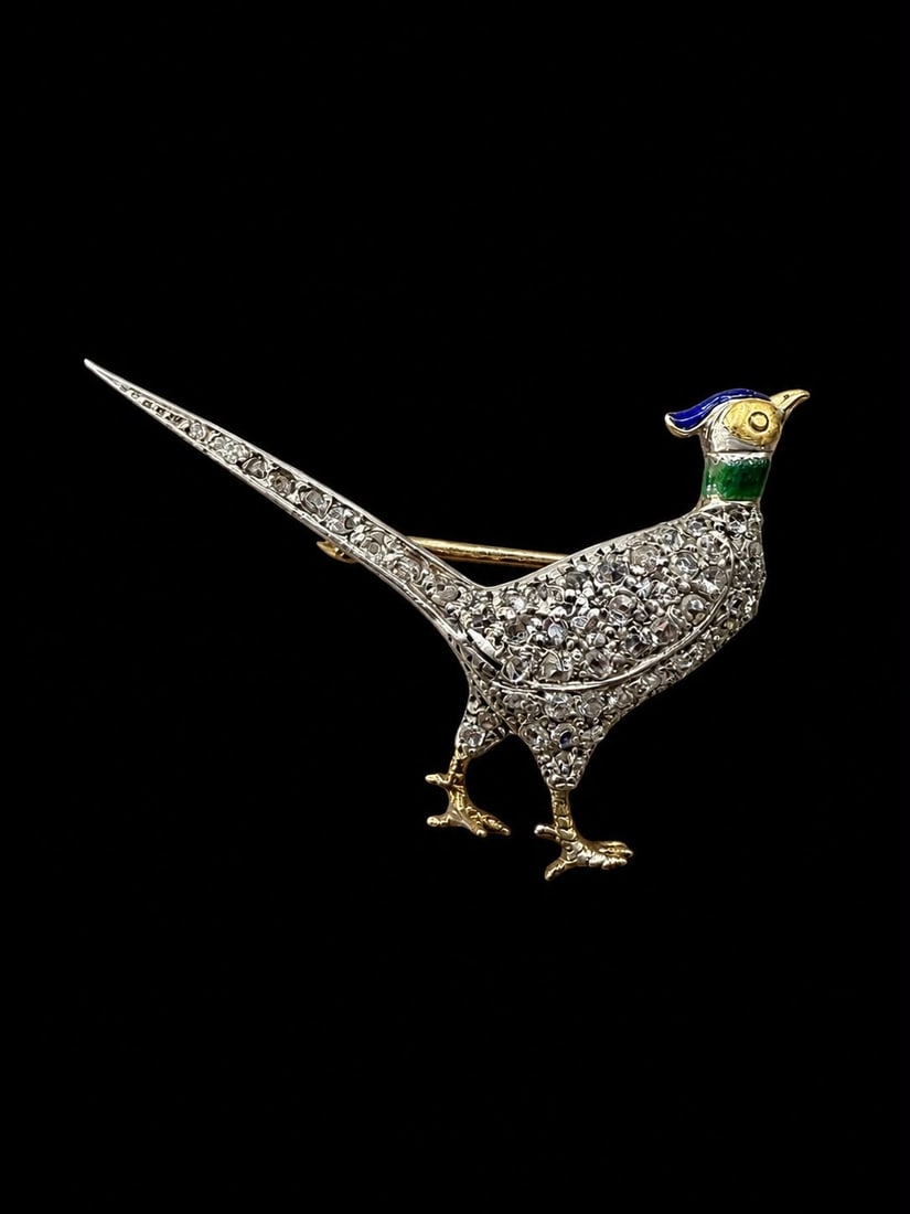 ANTIQUE ENAMEL AND DIAMOND BIRD BROOCH: ANTIQUE ENAMEL AND DIAMOND BIRD BROOCH, 3.6 grams, Testing high carat gold.Bright and lively diamonds.Enamel head.L. 3.5 cm.