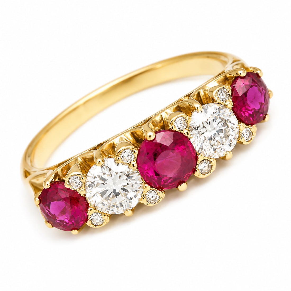 RUBY AND DIAMOND 5-STONE RING: RUBY AND DIAMOND 5-STONE RING,4,7 grams, testing 18 ct. gold.Rich and vibrant rubies, totalling approx. 1.35 ct.Diamonds bright and lively, totalling approx. 0.75 ct.Size N 1/2.