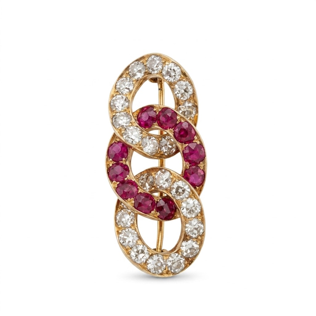 FINE EDWARDIAN RUBY AND DIAMOND ENTWINED BROOCH: FINE EDWARDIAN RUBY AND DIAMOND ENTWINED BROOCH,9.4 grams, testing high carat gold.Bright and lovely old cut diamonds, totalling approx. 3.30 ct.Rich and vibrant rubies, totalling approx. 2 ct.W. 3.7