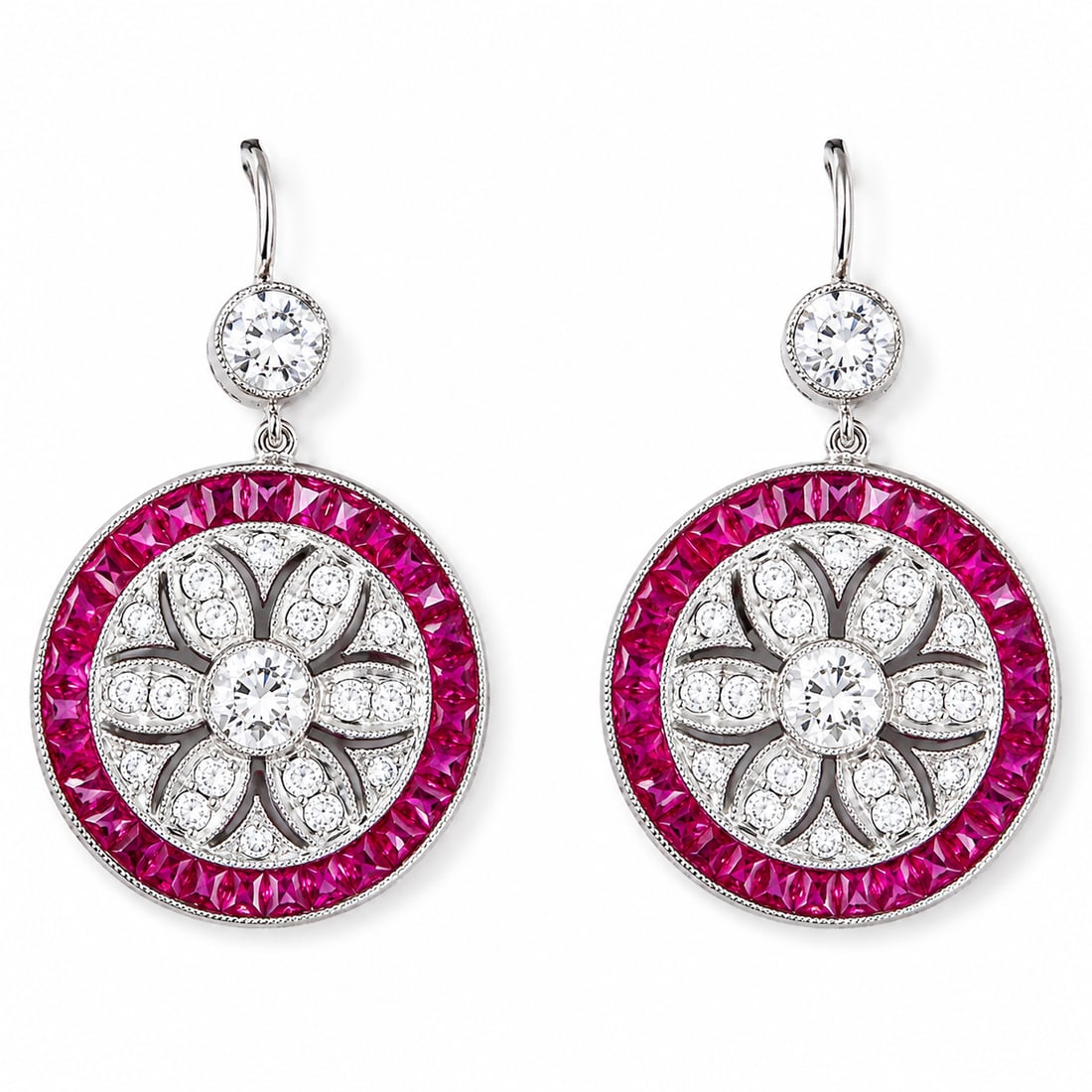 PAIR OF ART-DECO RUBY AND DIAMOND CLUSTER EARRINGS: PAIR OF ART-DECO RUBY AND DIAMOND CLUSTER EARRINGS,5.7 grams, testing high carat gold.Vibrant rubies.Diamonds bright and lively.L. 2.6 cm.