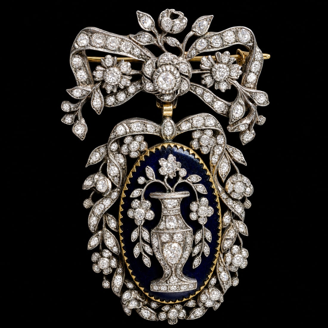 GEORGIAN ENAMEL AND DIAMOND DROP BROOCH: GEORGIAN ENAMEL AND DIAMOND DROP BROOCH, 20.7 grams, testing high carat gold and silver.The top of knotted bow design.Suspending a further diamond and enamel drop.Depicting a diamond set base.L. 5.8 c
