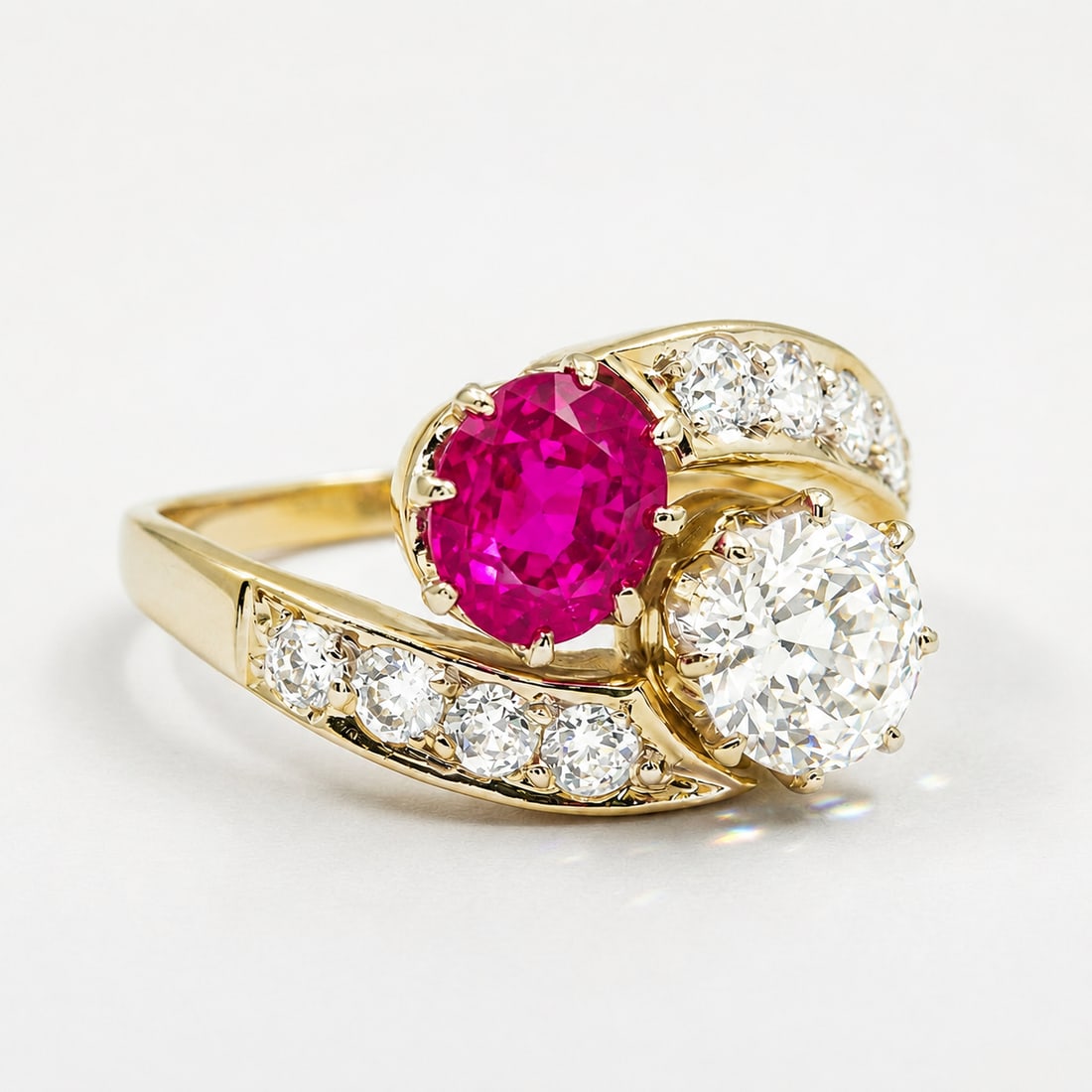 CERTIFICATED BURMA RUBY AND DIAMOND TOI-ET-MOI RING: CERTIFICATED BURMA RUBY AND DIAMOND TOI-ET-MOI RING,3,6 grams, testing 14 ct. gold.Rich and vibrant ruby of approx. 0.83 ct. (Certificated, Burma, No heat).Diamonds bright and lively.Size M 1/2.