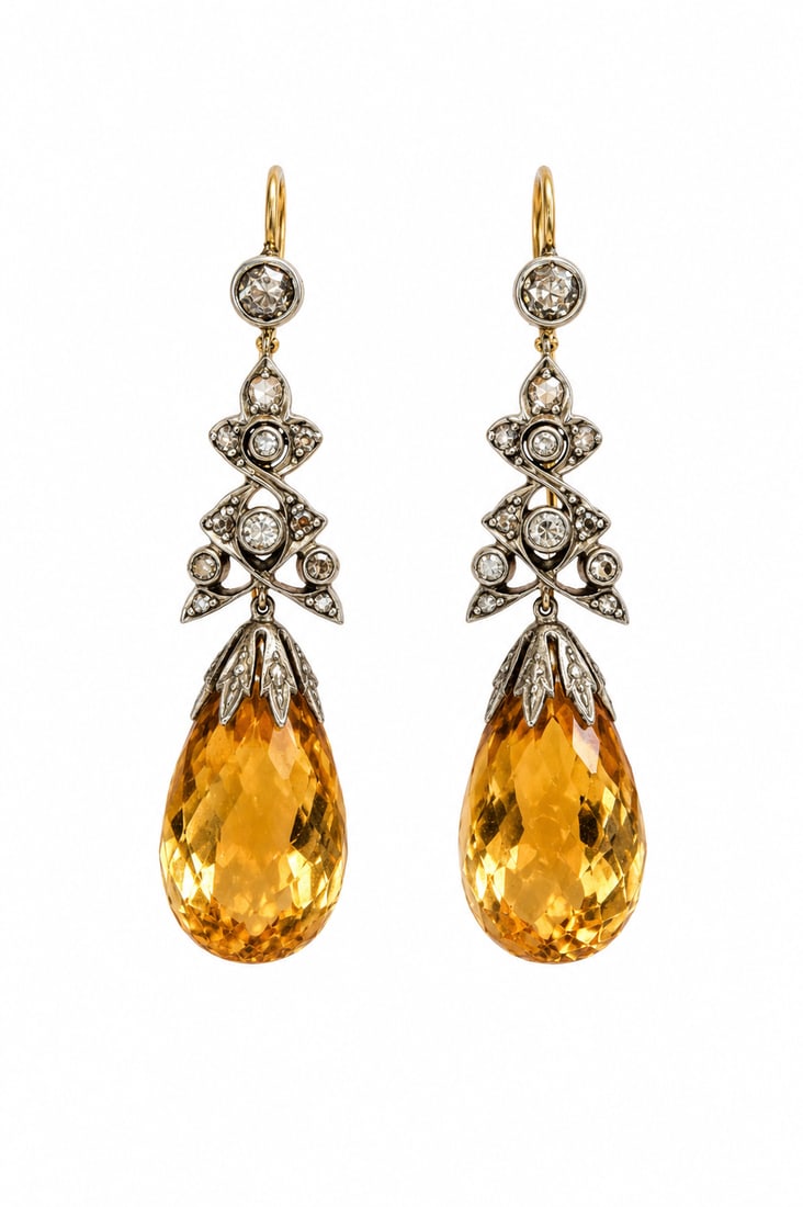 PAIR OF CITRINE AND DIAMOND DROP EARRINGS: PAIR OF CITRINE AND DIAMOND DROP EARRINGS,5,2 grams,Rich and vibrant citrines.Diamonds bright and lively. L. 4.4 cm.