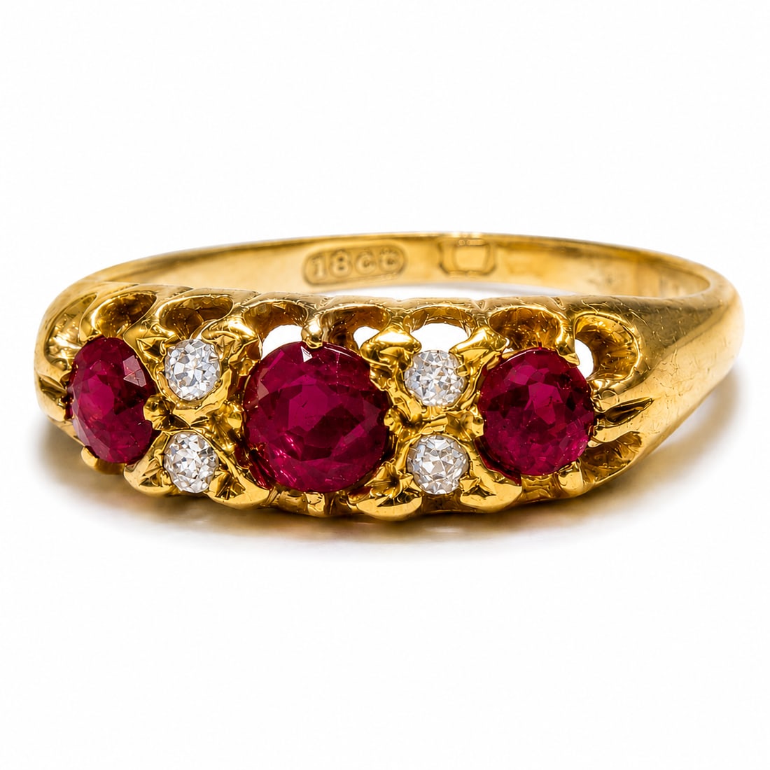 EDWARDIAN RUBY AND DIAMOND RING: EDWARDIAN RUBY AND DIAMOND RING,testing 18 ct. gold. (marks rubbed).Rich and vibrant rubies.Diamonds bright and lively.Size M 1/2.